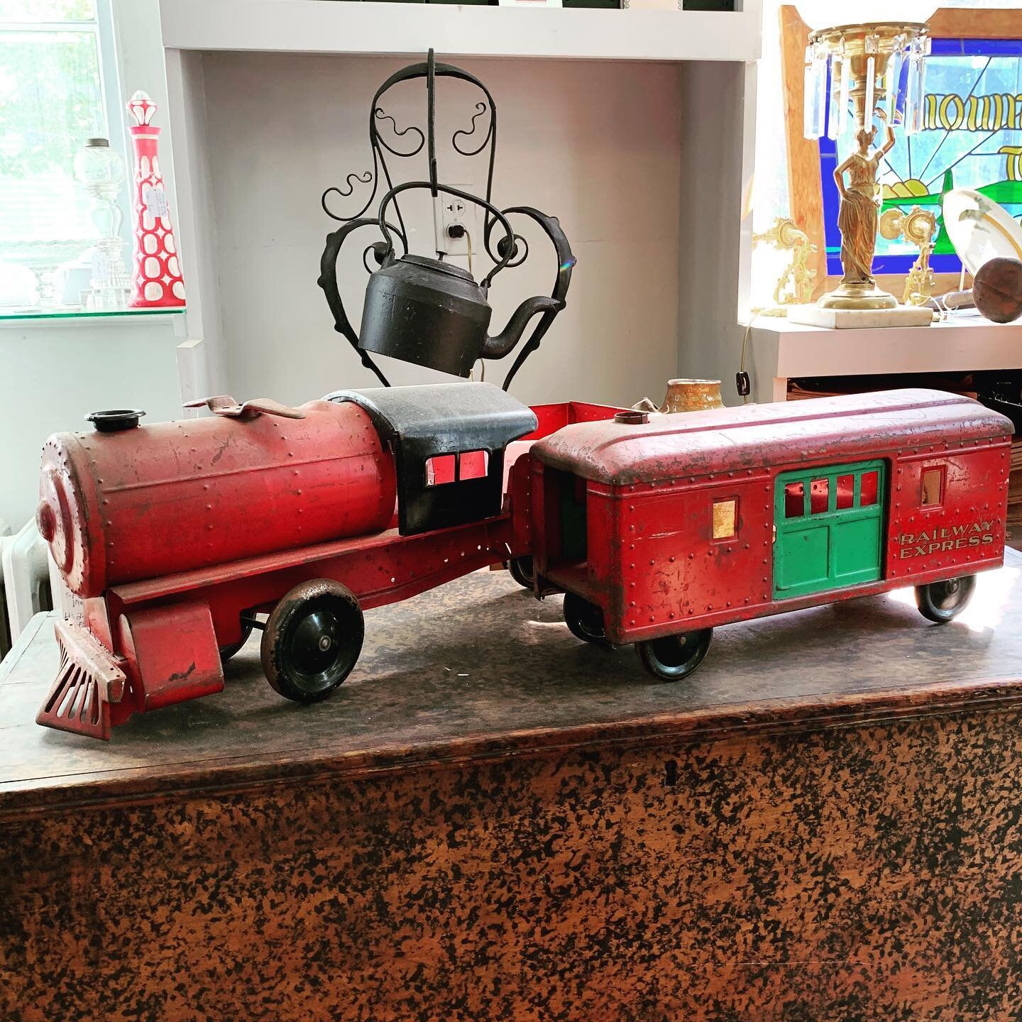 Who was the child playing with this toy train? Did her mother make tea in a black iron kettle as she choo-chooed the toy across the floor? Who did the girl grow up to be? 

Found at W.M. Schwind, Jr. Antiques &amp; Fine Art, Yarmouth, Maine

#histori