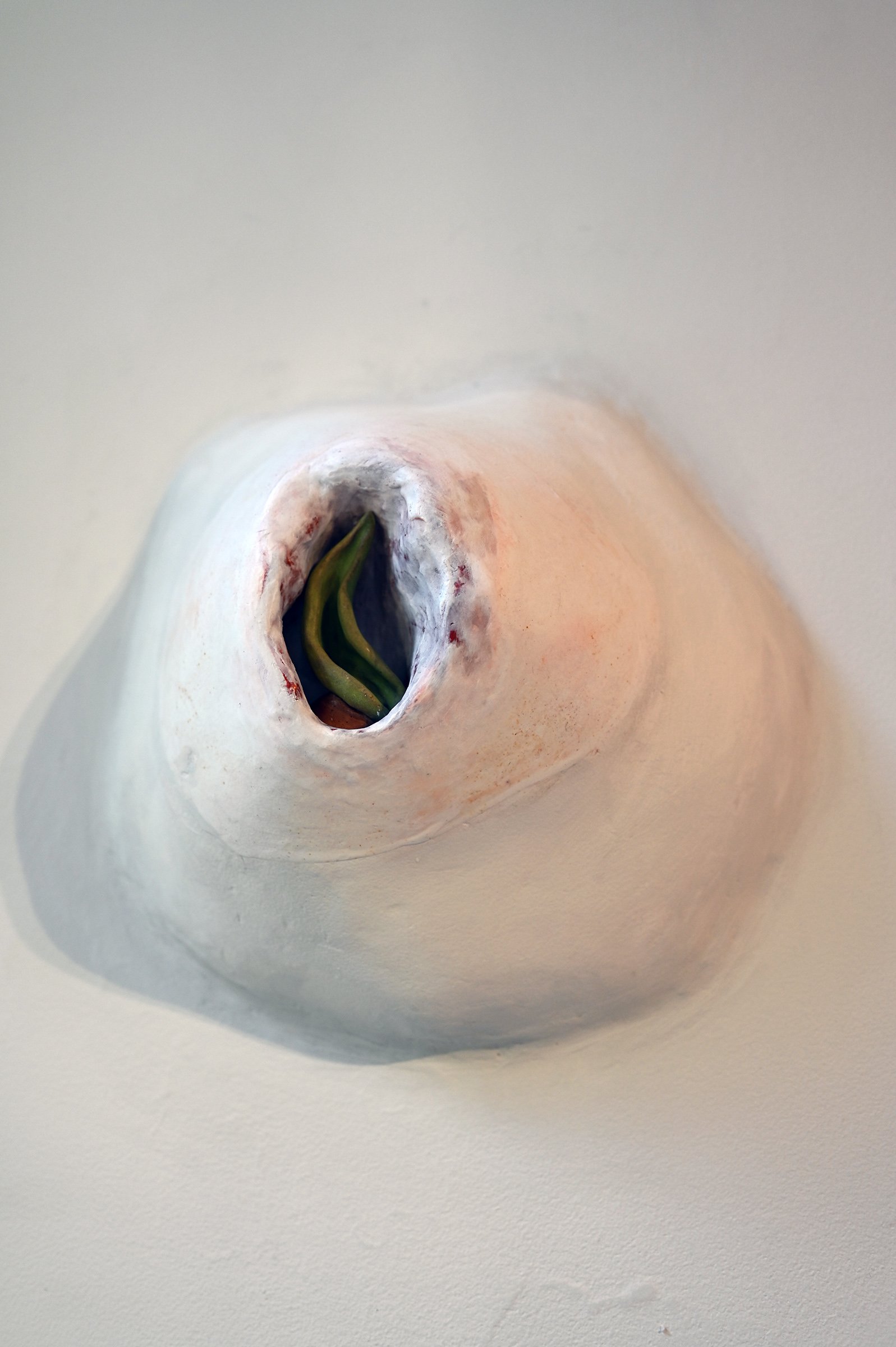  Nicki Cherry “Trepans”, 2021 Each approximately 8" x 5" x 4" Plaster, polystyrene, paint, wax, aromachemicals, paint, glazed ceramic stoneware   