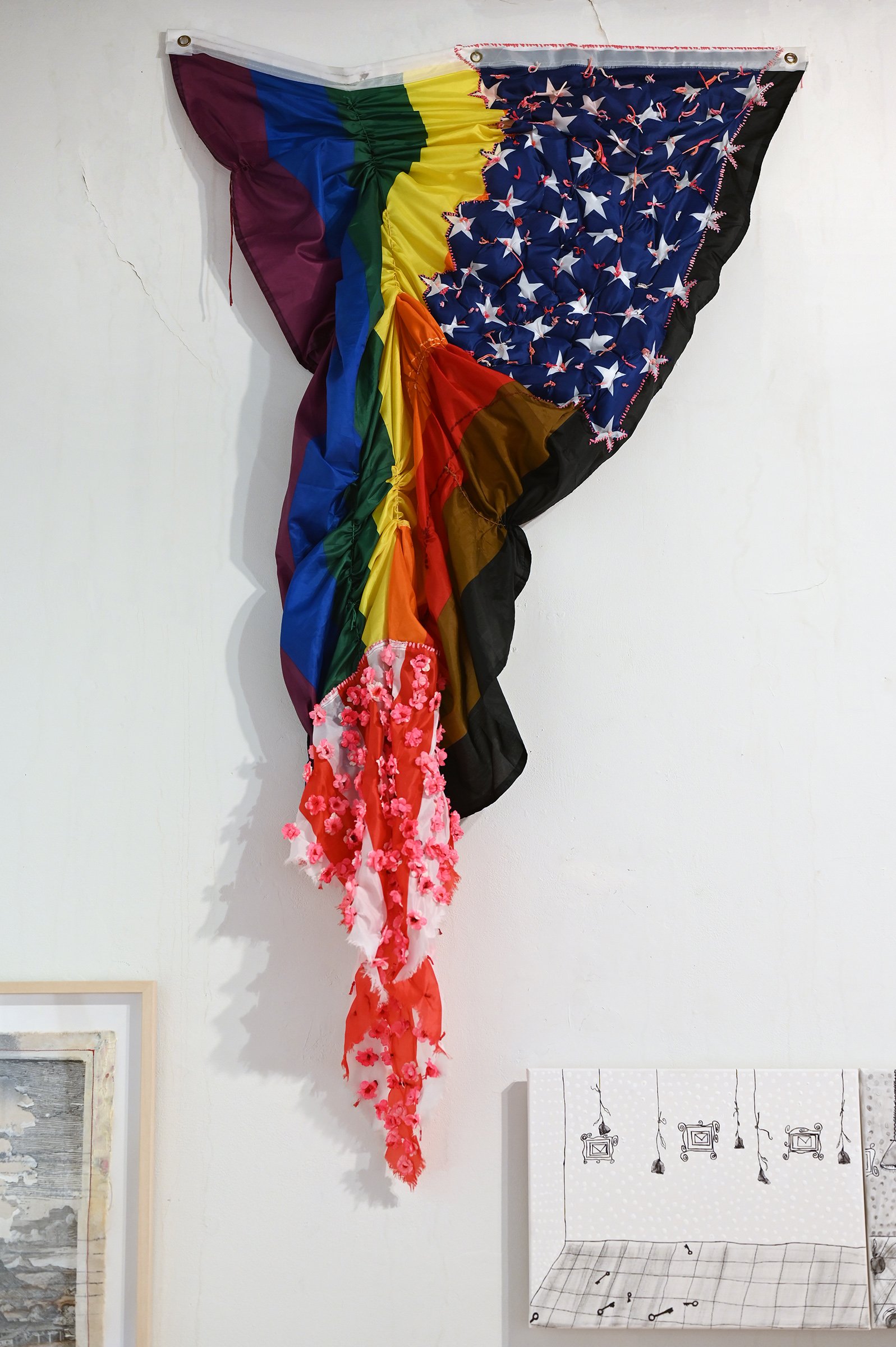  Sibley Barlow "Updated Rainbow Flag, Remade", 2018 30 x 55"  Flags, stuffing, faux flowers, embroidery, beads 