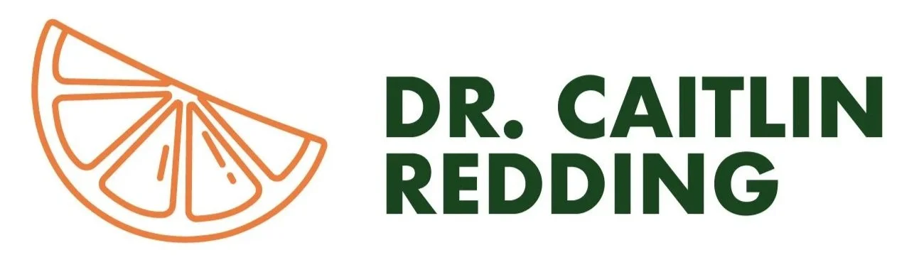 An orange orange slice with the words Dr. Caitlin Redding