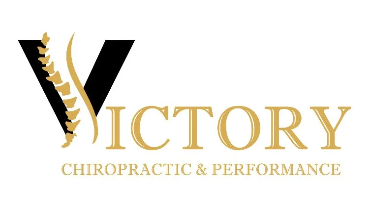 Victory Chiropractic & Performance logo with stylized gold spine and black V.