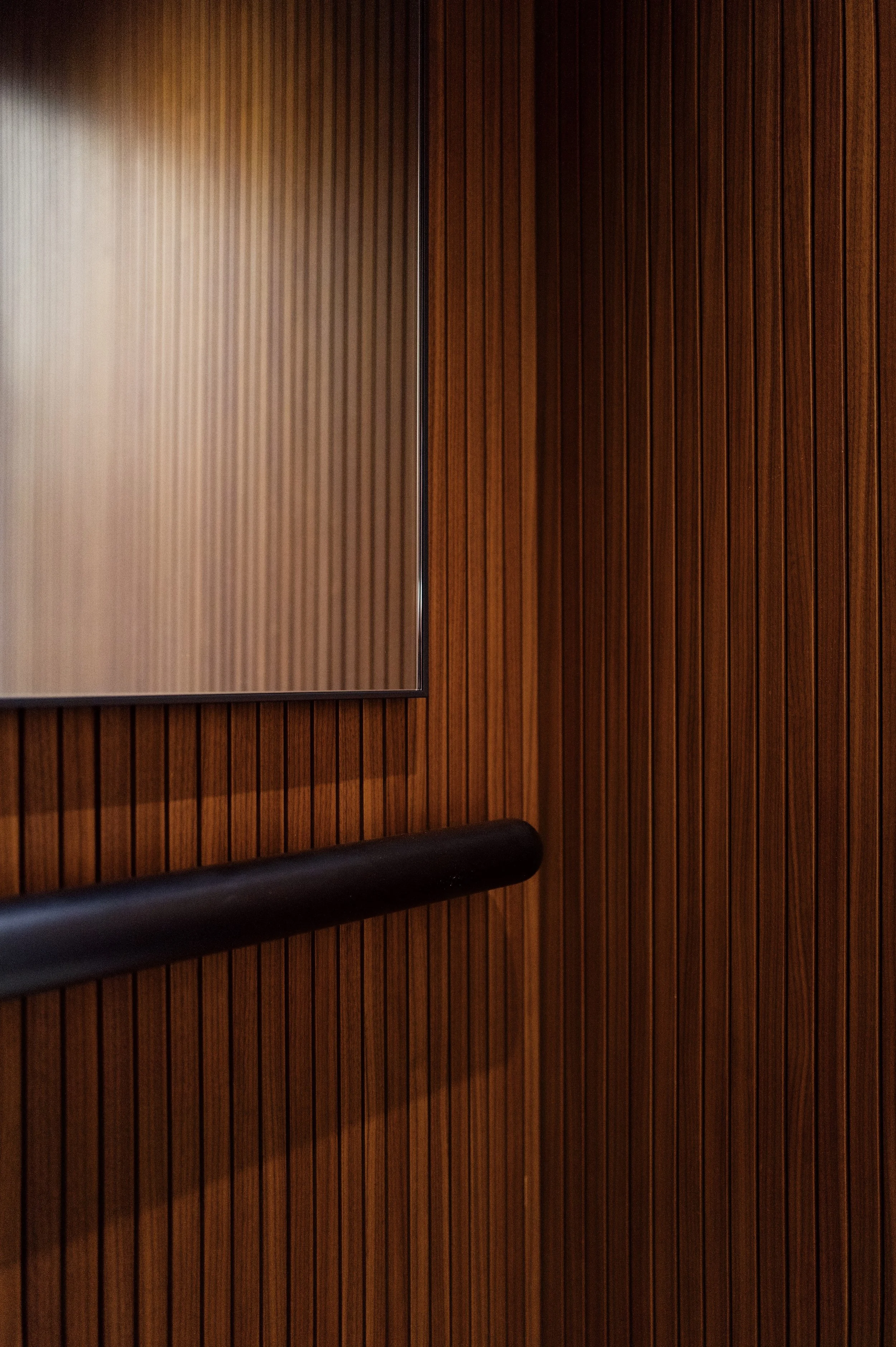 Custom wood-slat paneling detail in a West Village townhouse by JG Neukomm Architecture