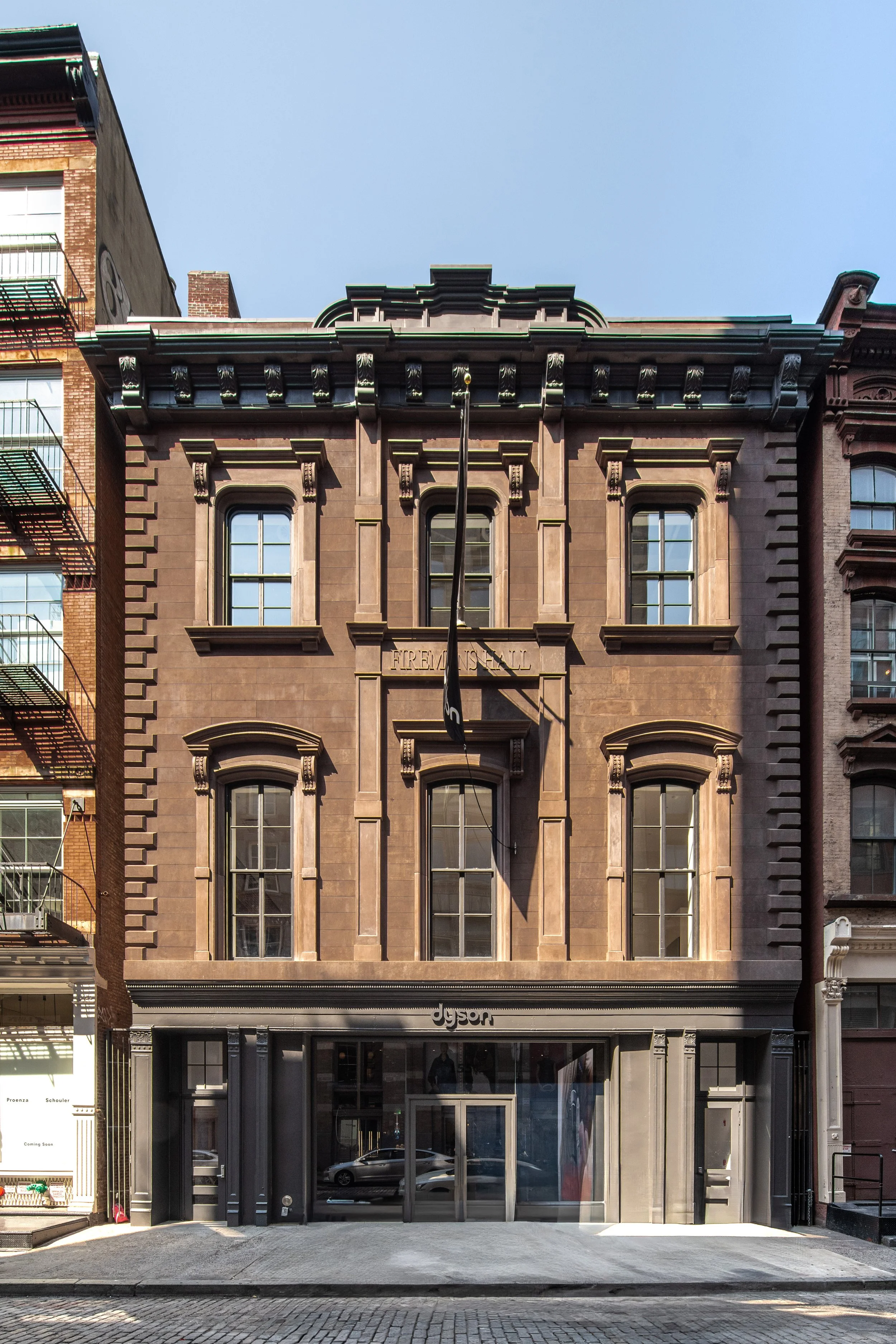 Dyson Demo Store historic brick and cast-iron facade with street-level brand signage