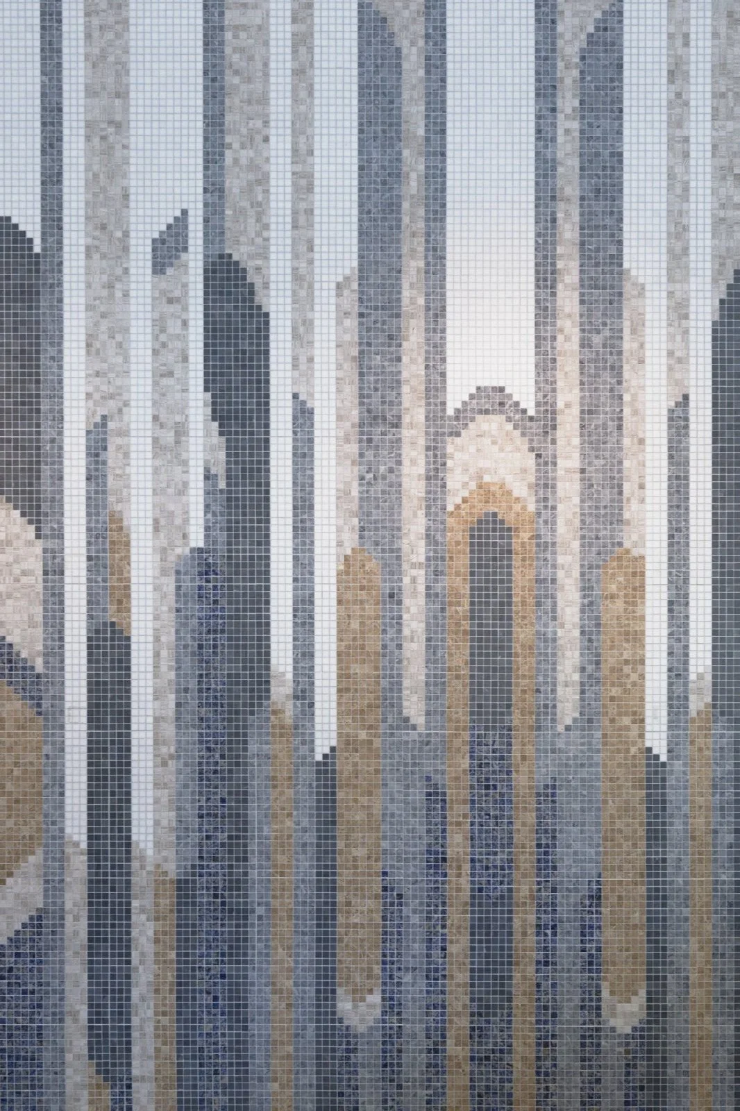 JGNA residential lobby detail of a blue and gold glass mosaic depicting an abstract city skyline