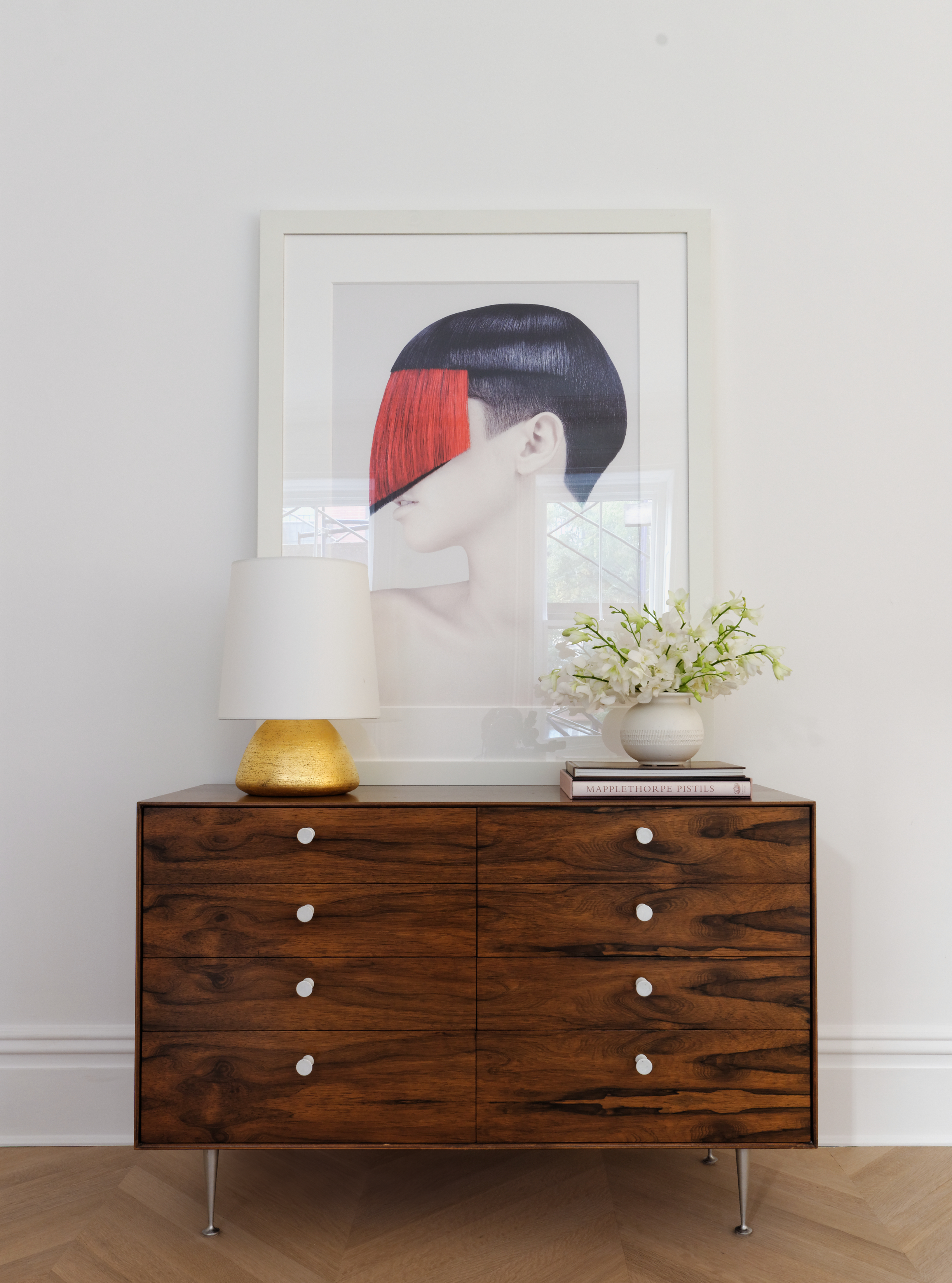 close up view up wooden storage dresser  in fabien barons west village townhouse by JGNA