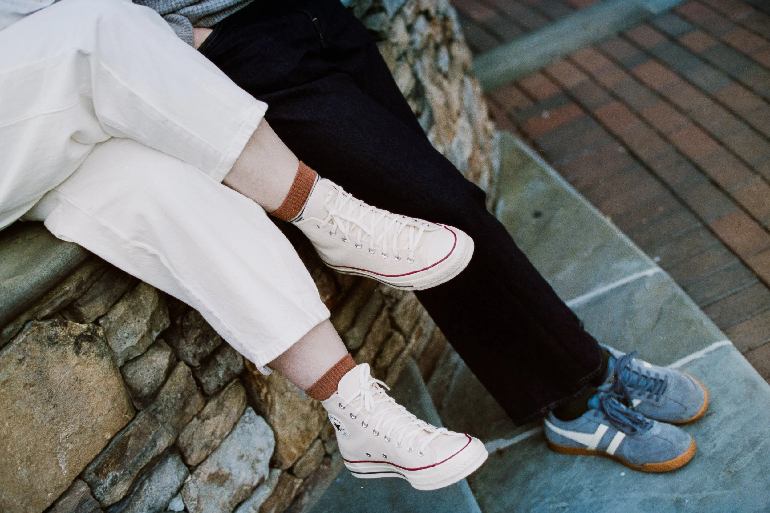 Film Engagement Photos on The Green Uptown Charlotte St Peter Catholic Church by wedding photographer ParksPictures