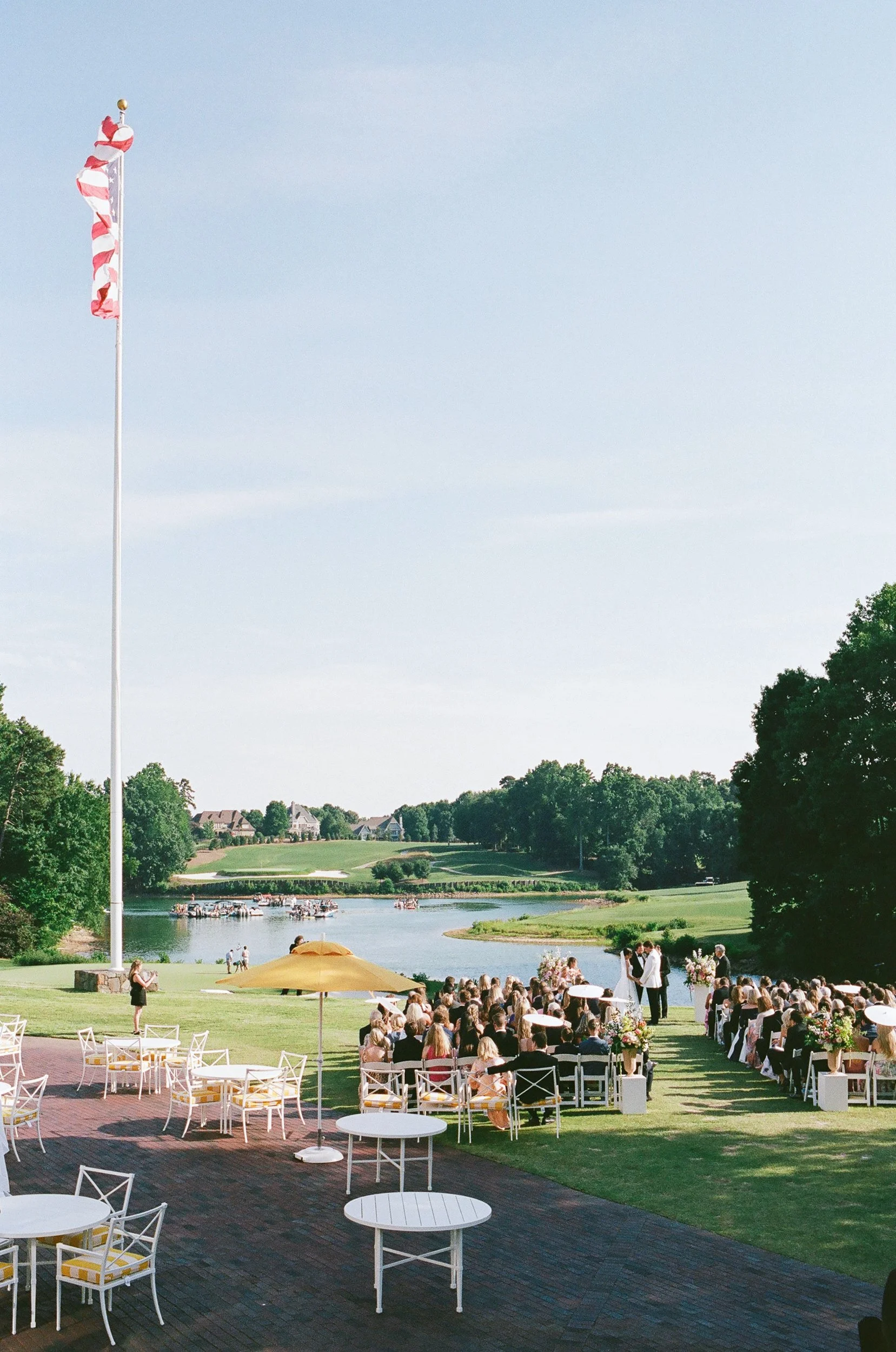Wedding on film analogue on Function Lawn at Lake Norman at Trump National Golf Club Charlotte by ParksPictures
