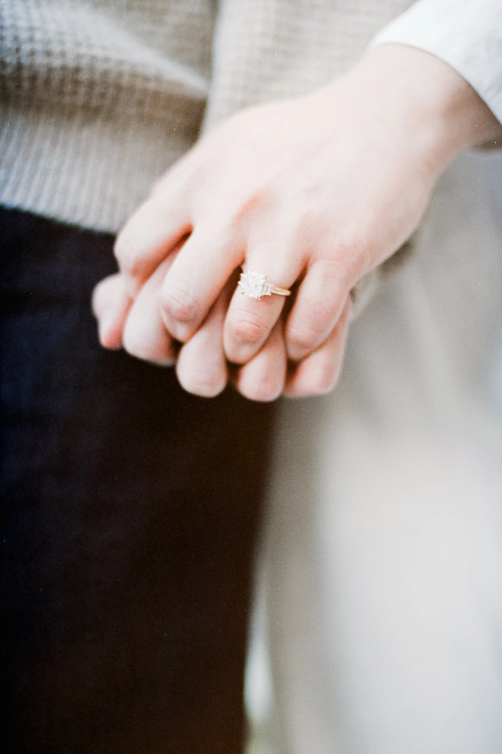 Film Engagement Photos on The Green Uptown Charlotte St Peter Catholic Church by wedding photographer ParksPictures