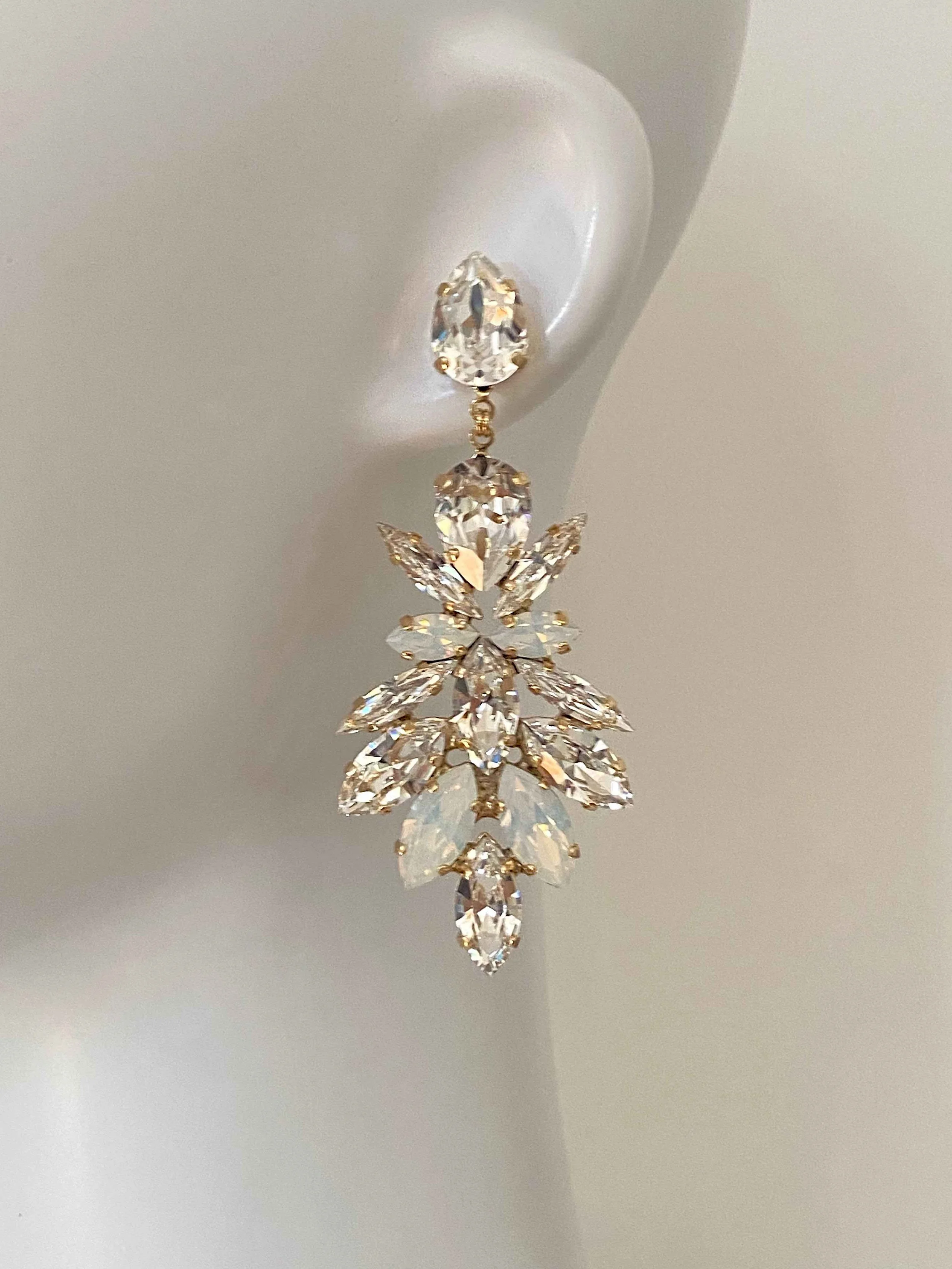 Stones Of Atlantis Romanou Drop Earrings in white opal on head