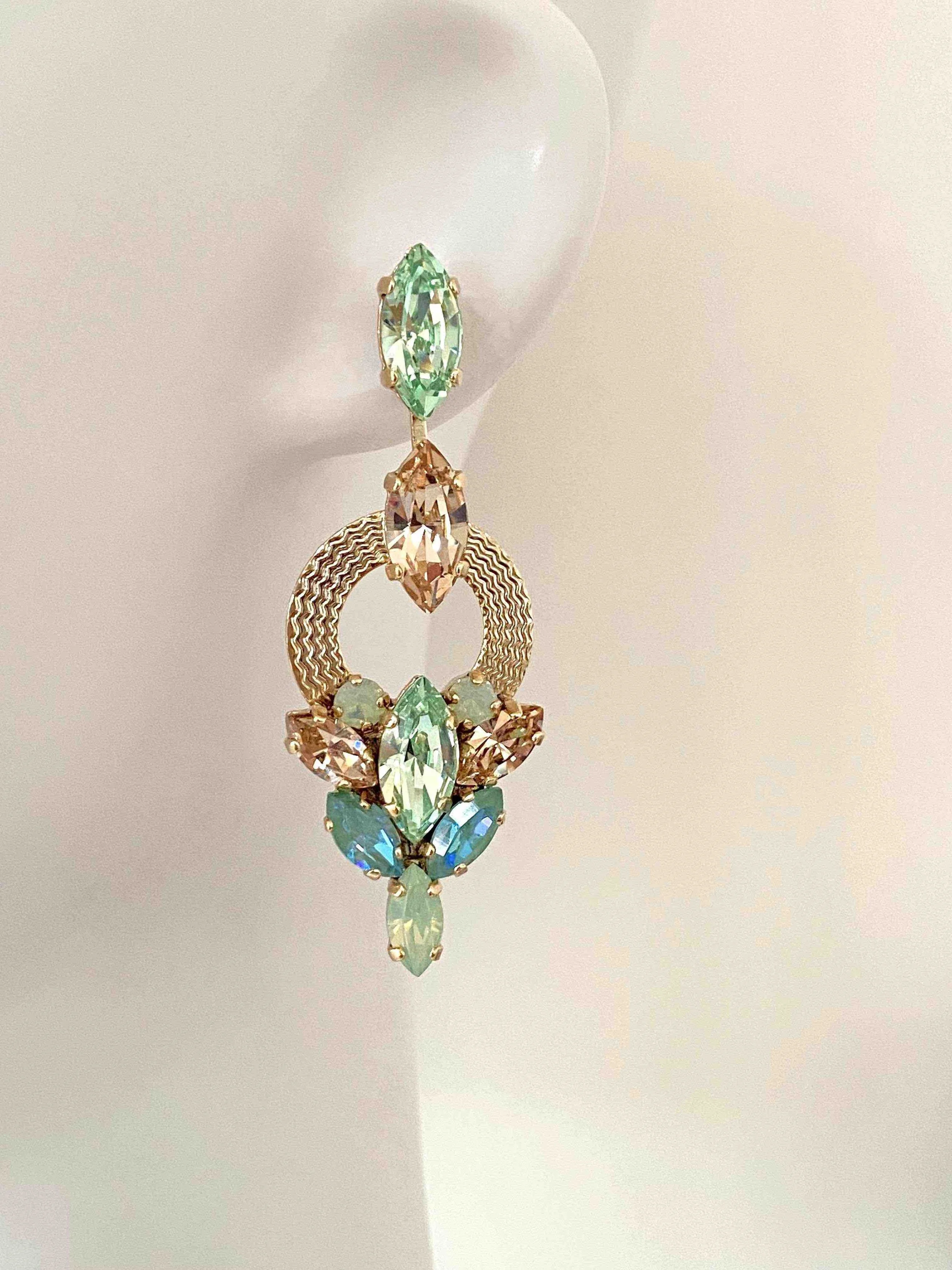 Stones Of Atlantis Ioulia Drop Earrings in chrysolite on head