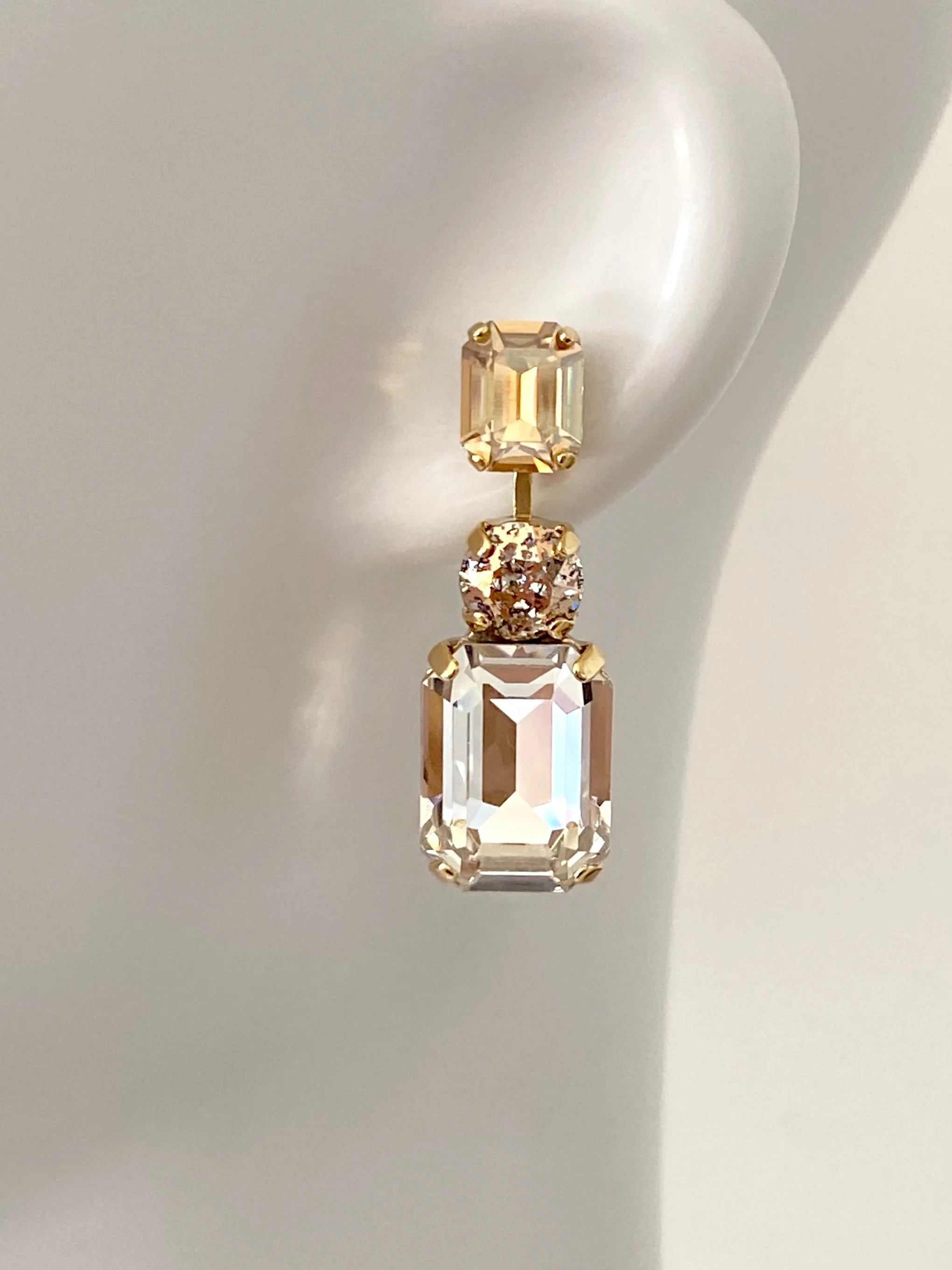 Stones Of Atlantis Kouros Drop Earrings (L) in nudes on head