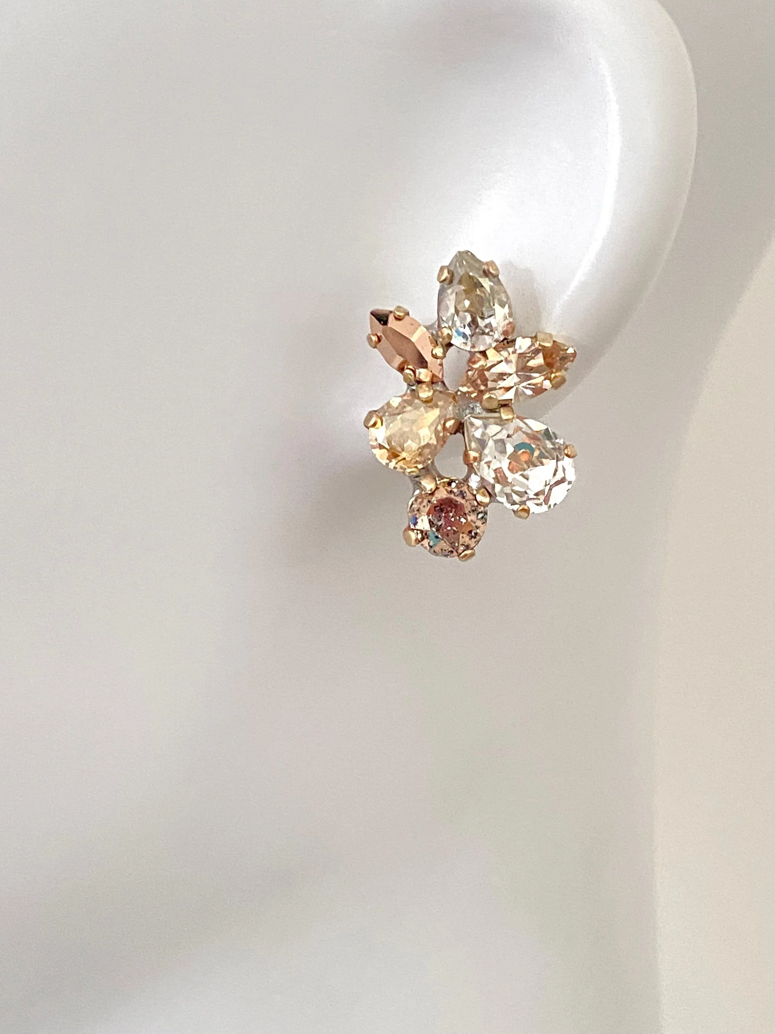 Stones Of Atlantis Delphini Stud Earrings in nudes on head