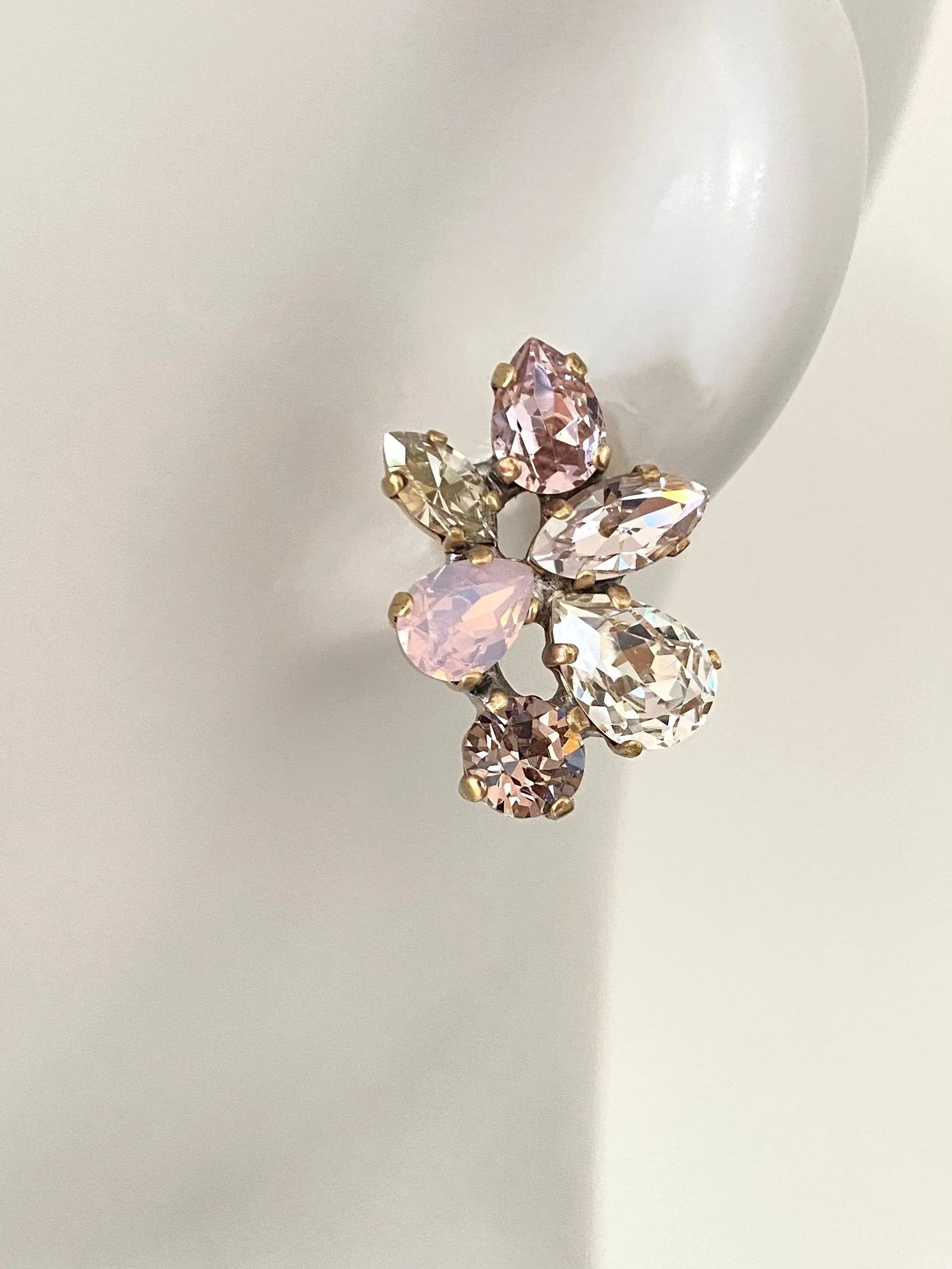 Stones Of Atlantis Delphini Stud Earrings in rosaline on head
