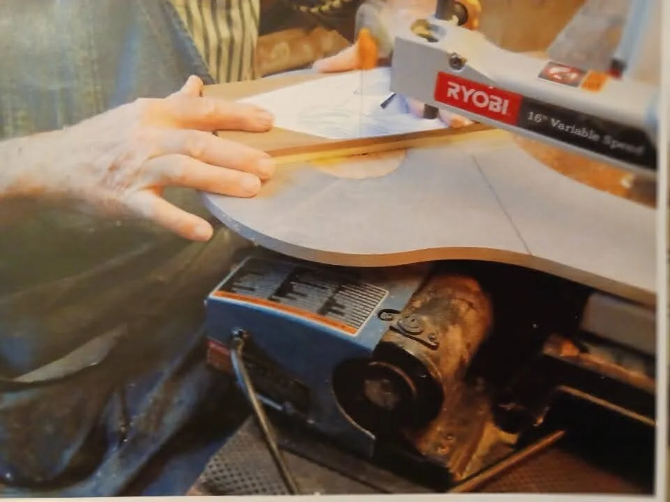 Cutting 2 types of wood at the same time in order to put them together.