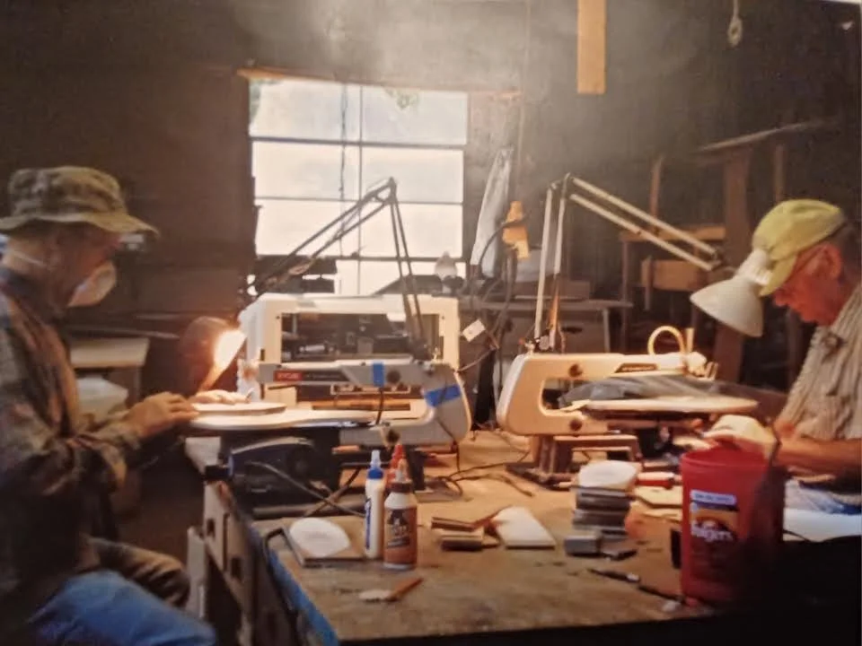Jerry and his son, Mark, in Jerry's workshop.