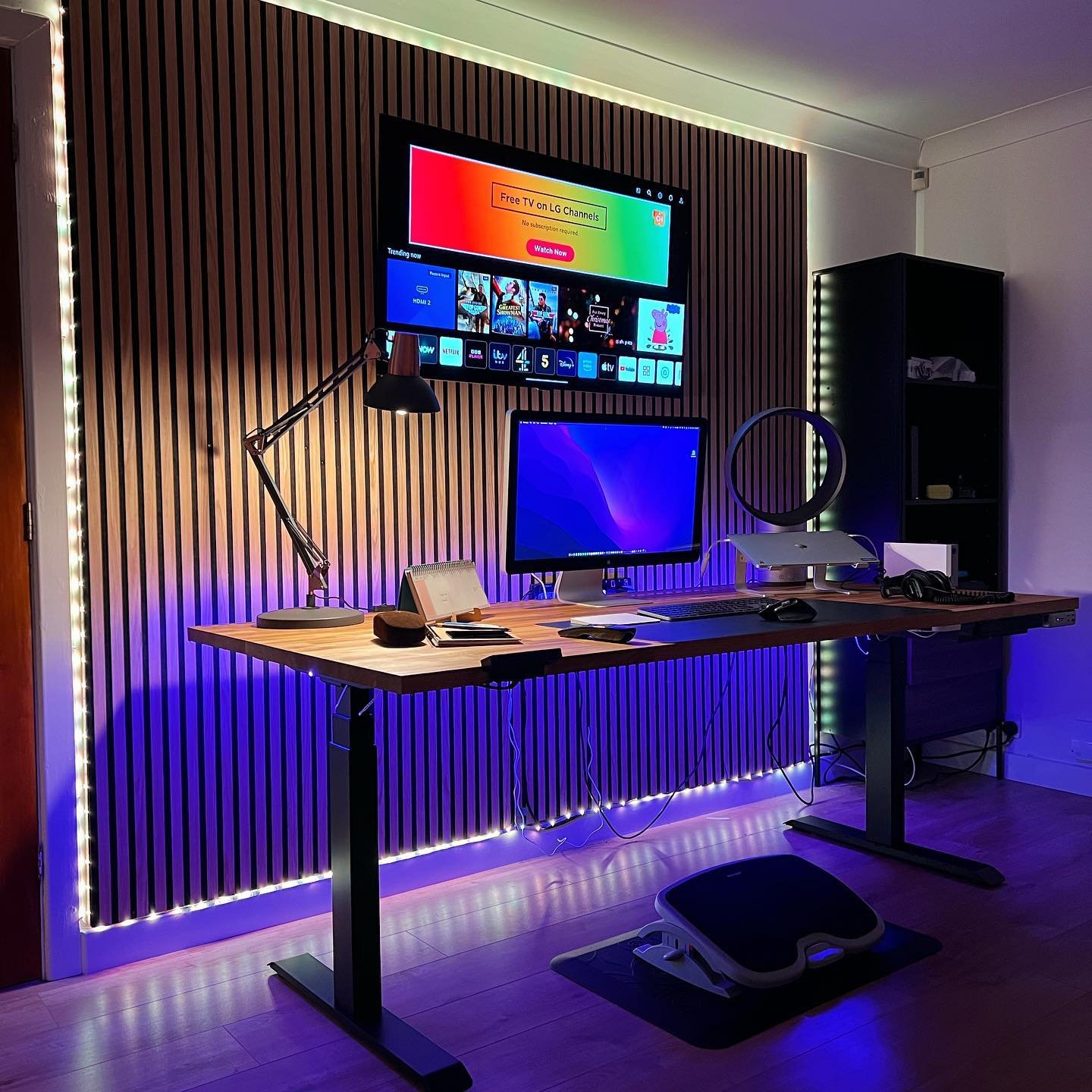 Phase one of my office space is complete. Love the Slat-Lite acoustic wood panels from @thewoodveneerhub - looks great with the @goveeofficial led strips. Seems to give more depth to the sound from the TV. Also, great to hide the wires. 
#officebuild