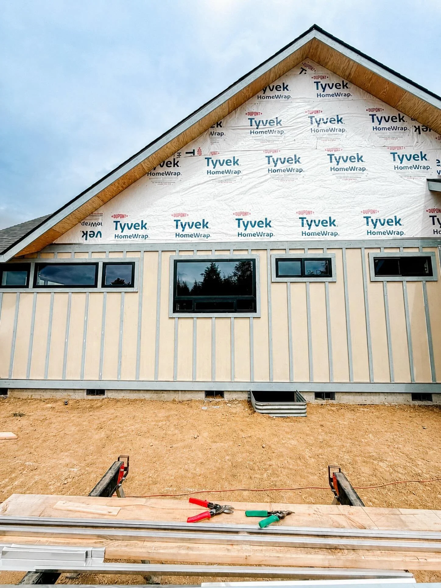 The exterior is finally starting to tell the story we envisioned.

This week the board and batten is going up on the lower portion of the house, and soon the peaks will be finished with horizontal siding. We loved the idea of mixing the two styles to