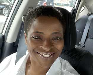 Cheryl Toure, CNA, supports patients and families at Lotus Blossom Hospice.