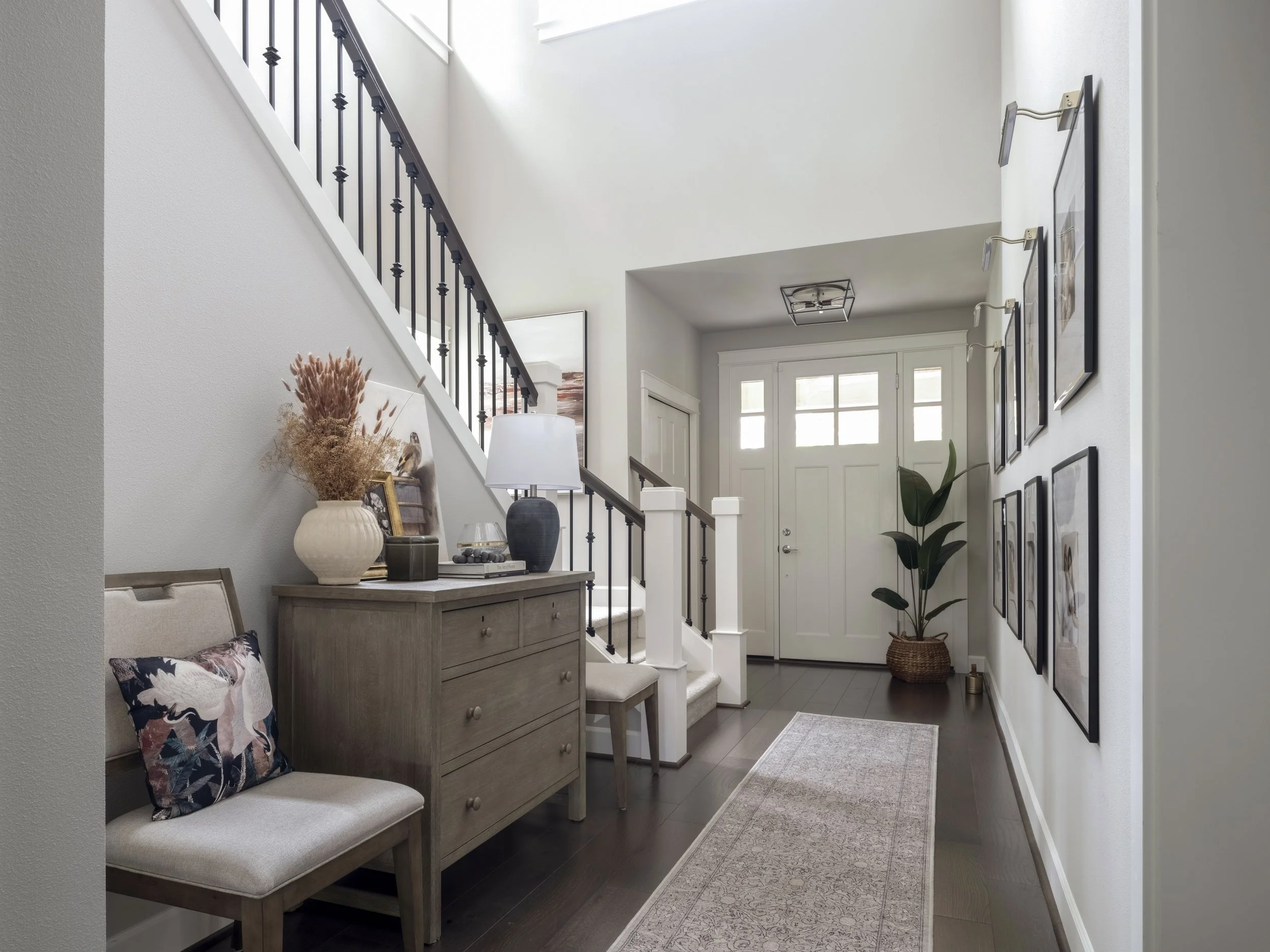 “Have an Empty Corner Between Floors in Your Townhome? Try This Simple, Low-Profile Layout Trick to Turn an Awkward Landing into a Cozy, Useful Space.”