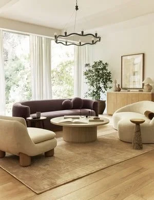 “Is Your Furniture Layout Feeling a Little Too Boxy? Try This Simple ‘Organic Curve’ Swap to Instantly Make Your Living Room Flow Better.”