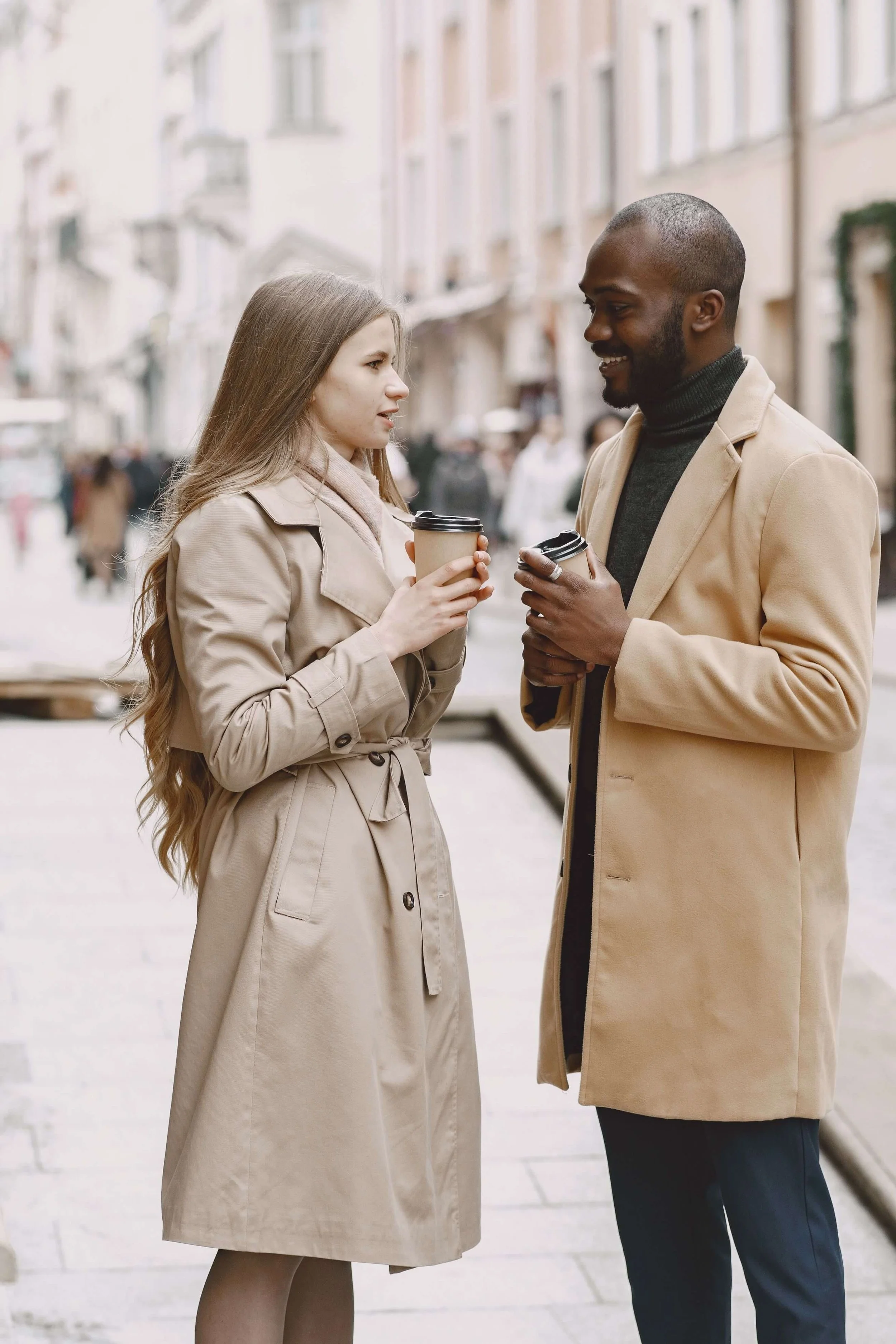 Woman in France speaking French young man