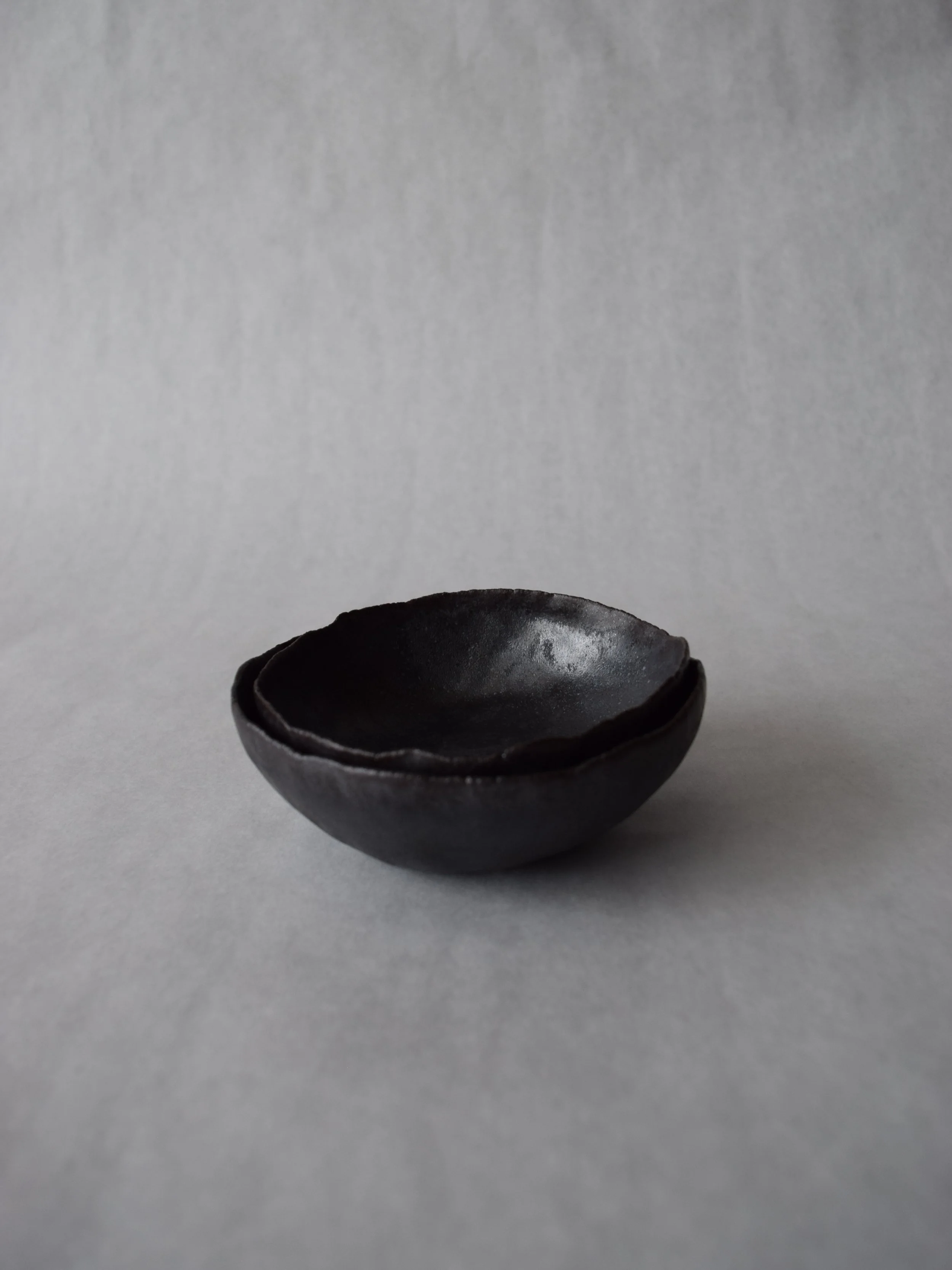 Kimball Slade Studio – shino glaze black nesting bowl set