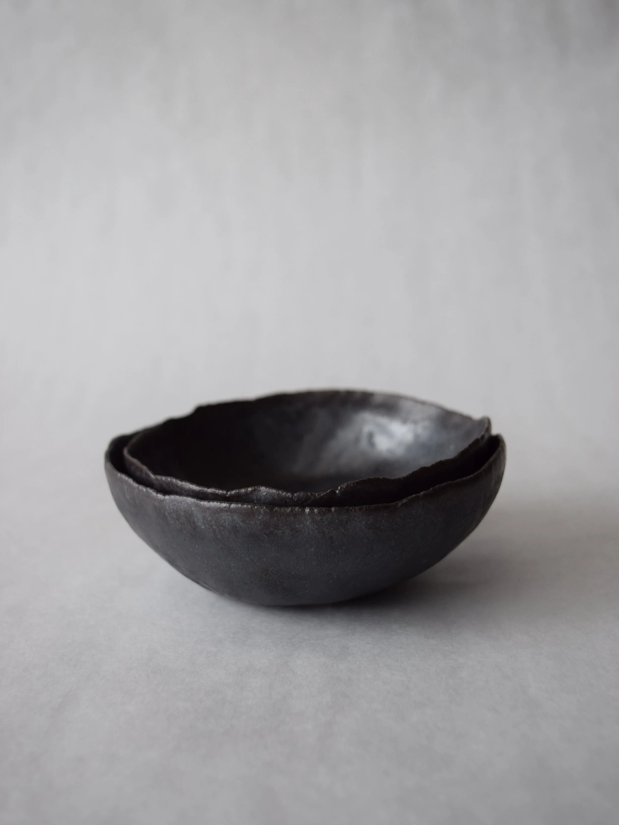 Kimball Slade Studio – shino glaze black nesting bowl set
