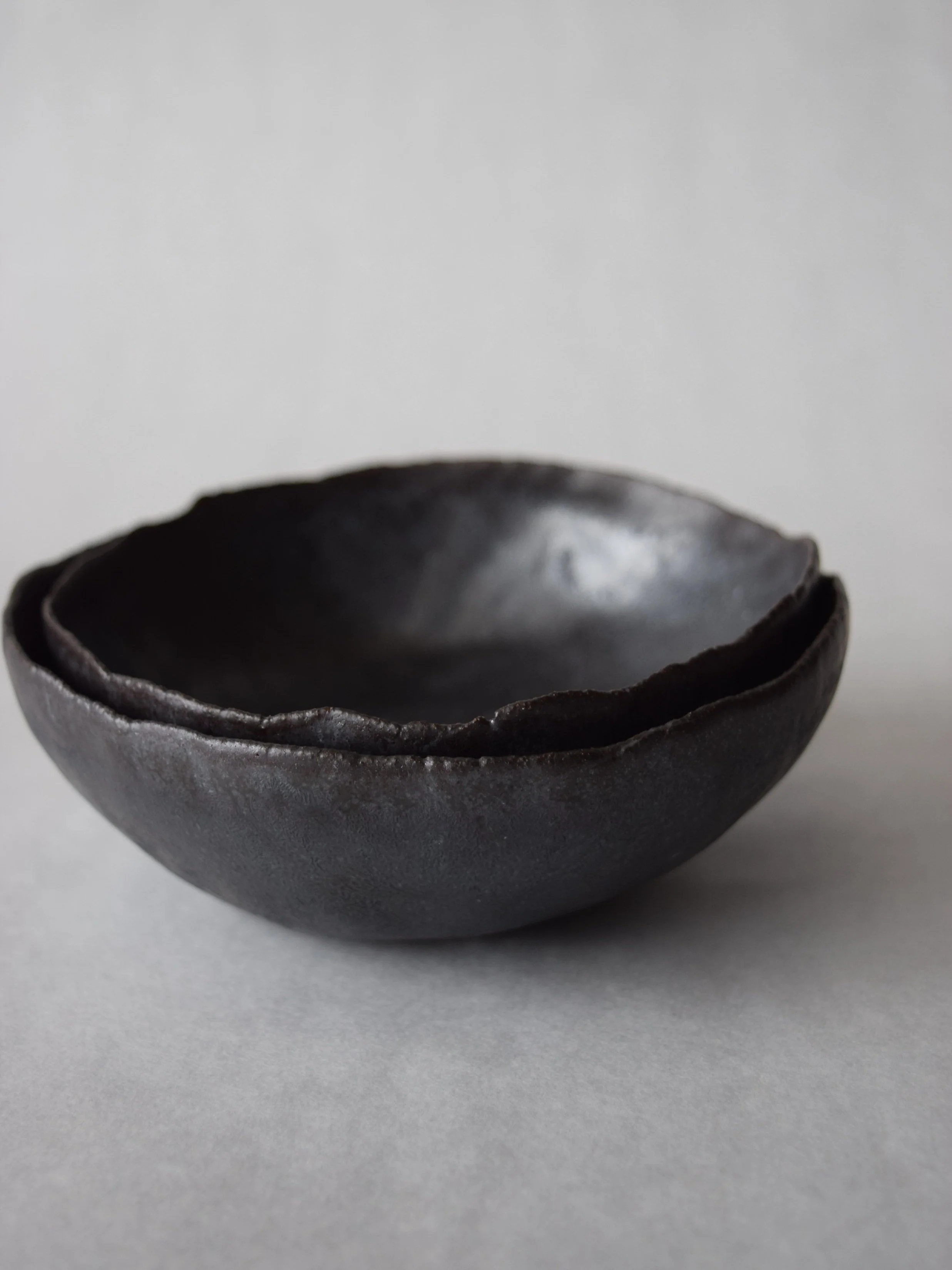 Kimball Slade Studio – shino glaze black nesting bowl set
