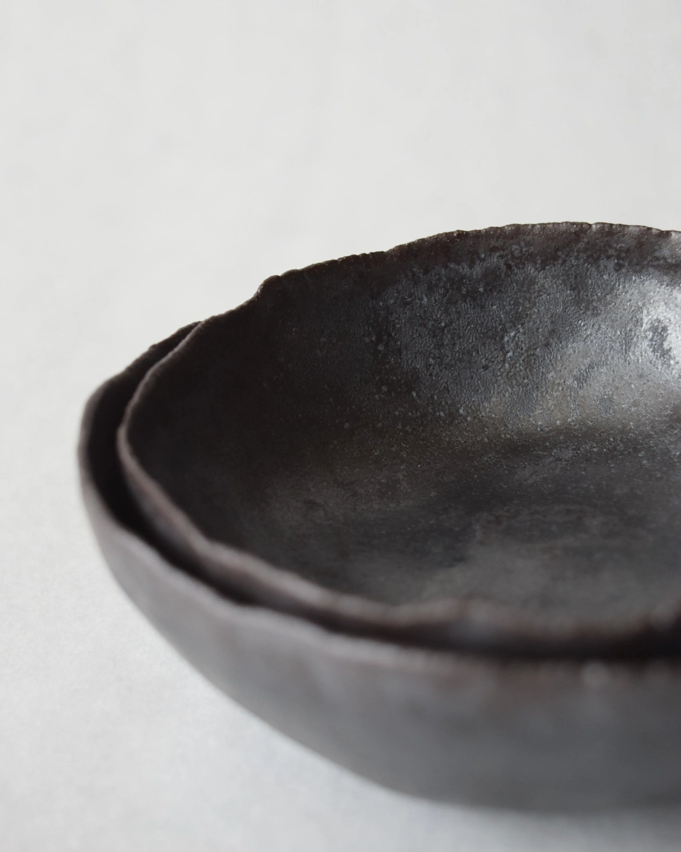 Kimball Slade Studio – shino glaze black nesting bowl set