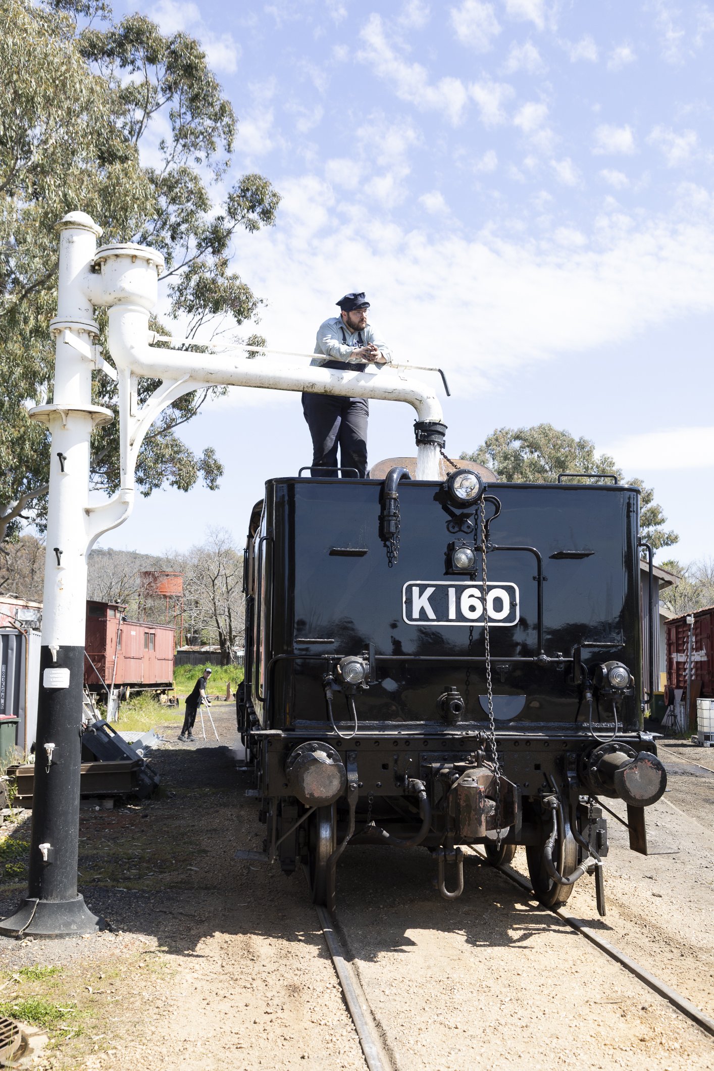 K 160 gets some water from the column at Maldon on the Victorian Goldfields Railway. Addison Chapman fireman attending. Scott Gould A Railway Life photography
