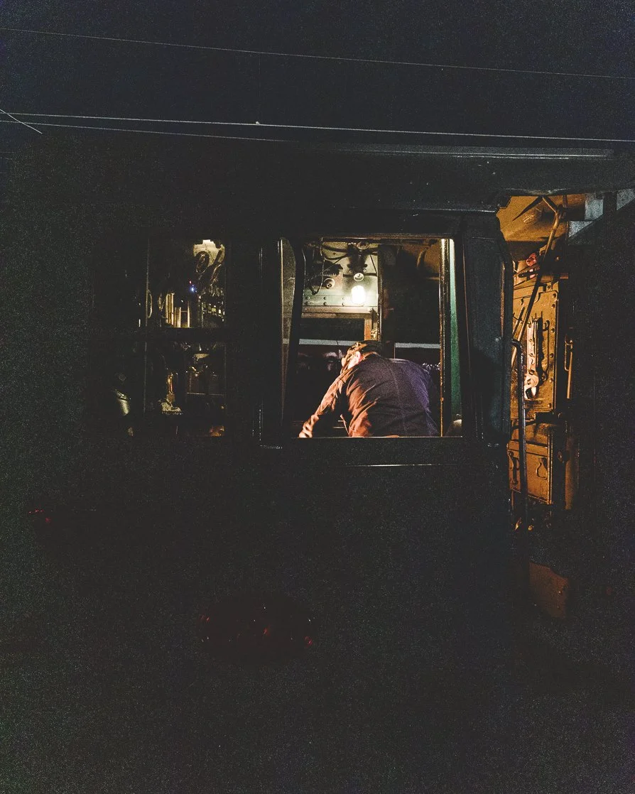 Steam loco JA 1271 at Palmerston North with the fireman shovelling coal into the firebox. Scott Gould Railway Life fine art photography train photography