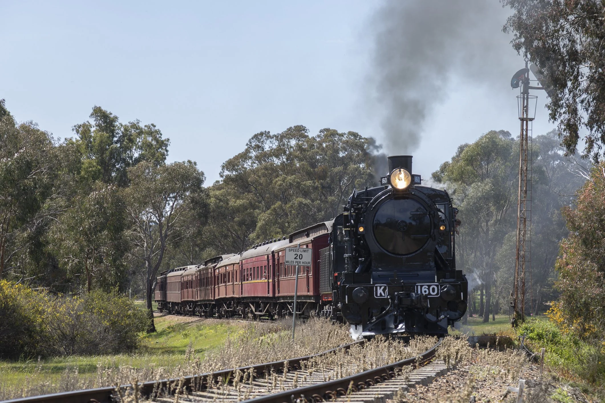 K 160 and J 549 lead a train on the Victorian Goldfields Railway past the home signal at Maldon. Scott Gould A Railway Life photography