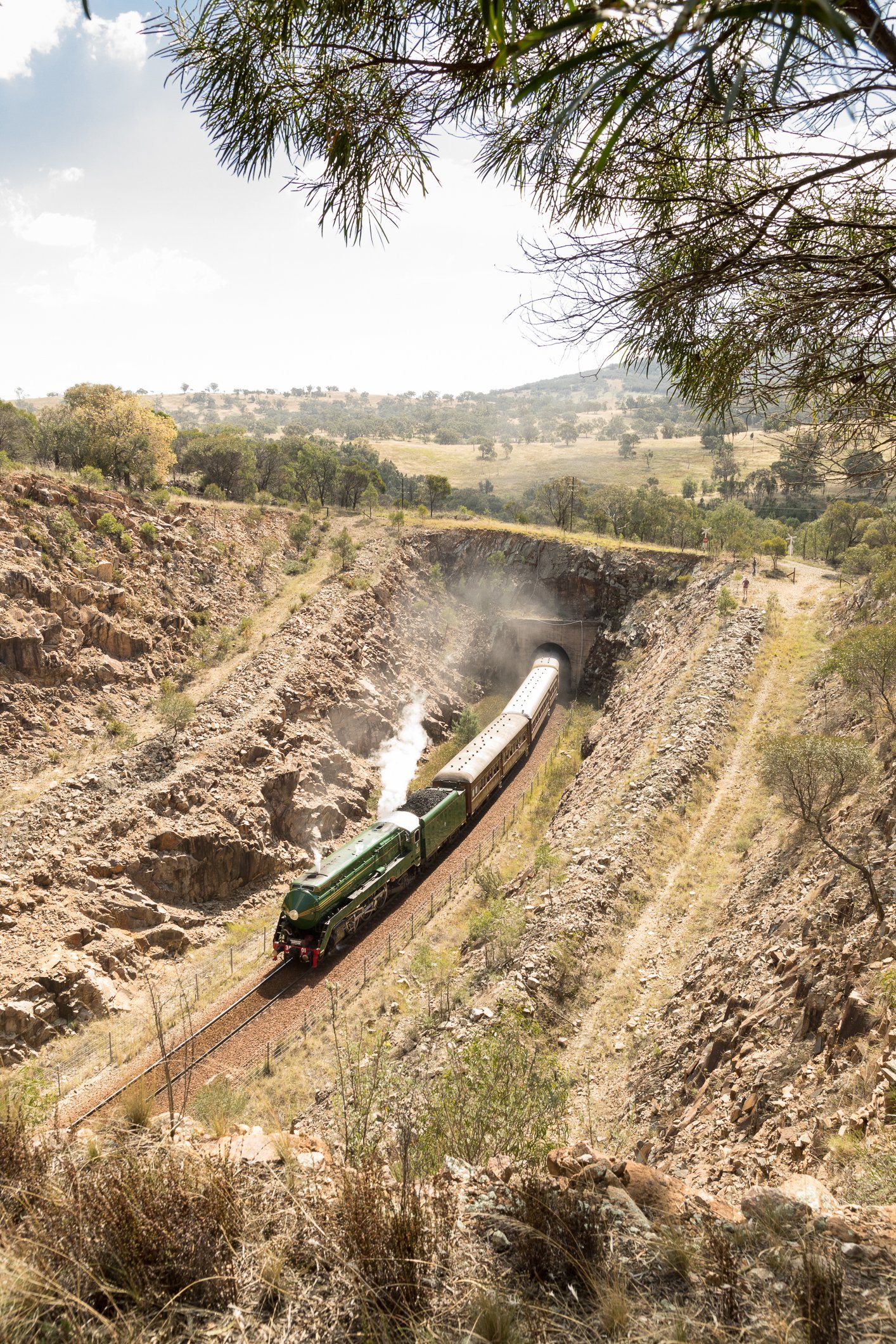 Steam Locomotive 3801 and heritage train passing between two tunnels of the bethungra spiral, between Junee and Cootamundra. Scott Gould A Railway Life photography