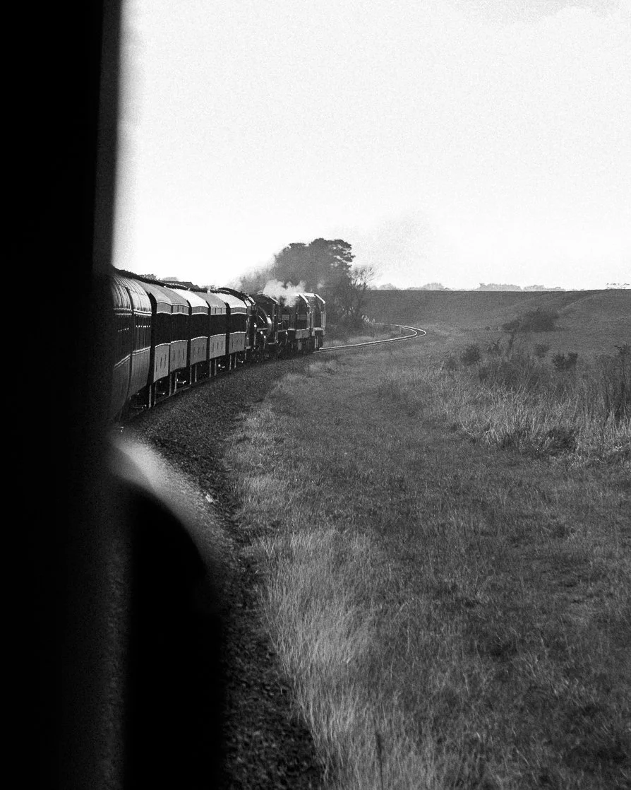 The FRONZ 50th anniversary 'Celebration Express' on twisting track near Levin, New Zealand photographed from the train in black and white railway photography fine art photo Taken by Scott Gould A Railway Life fine art photography