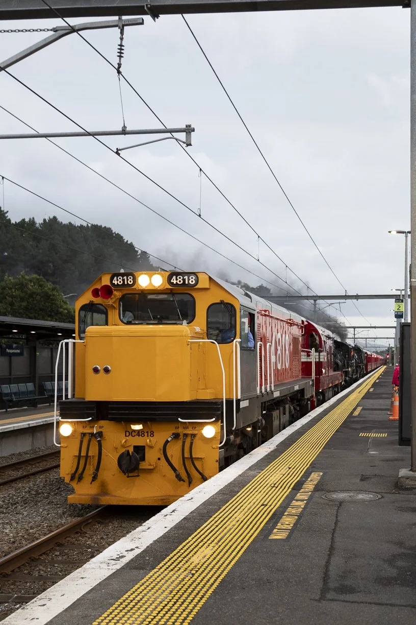 The FRONZ 50th anniversary Celebrations Express train pulls into Paraparaumu station led by vintage diesel DC 4818 and heritage steam engines Taken by Scott Gould A Railway Life fine art photography