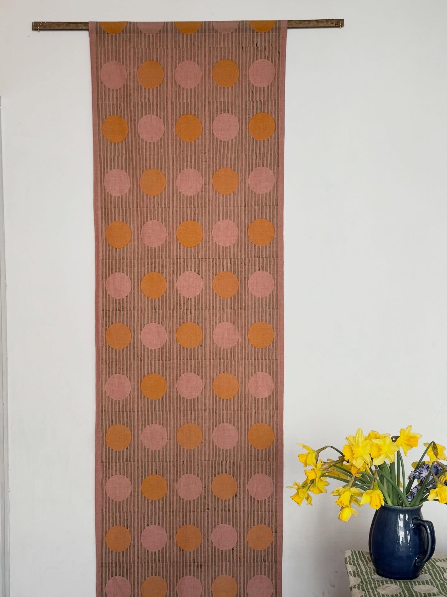 My go-to stripes and dots pattern in pink and yellow on naturally dyed, organic cotton. Oak dowels are included with each panel to be slotted into a top and bottom looped hem so they hang beautifully (the dowels didn&rsquo;t arrive in time for my ini