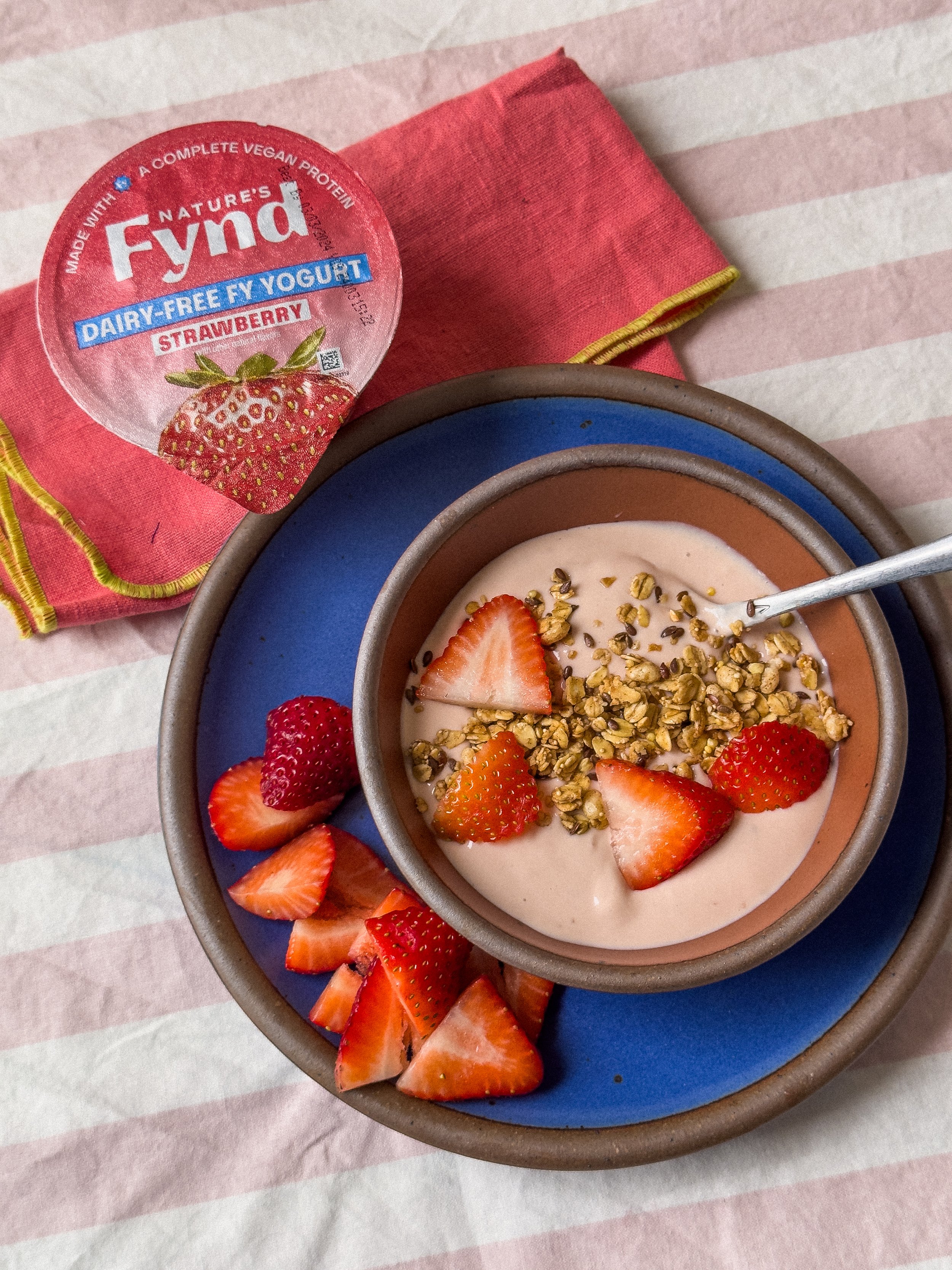 Strawberry yogurt tabletop scene