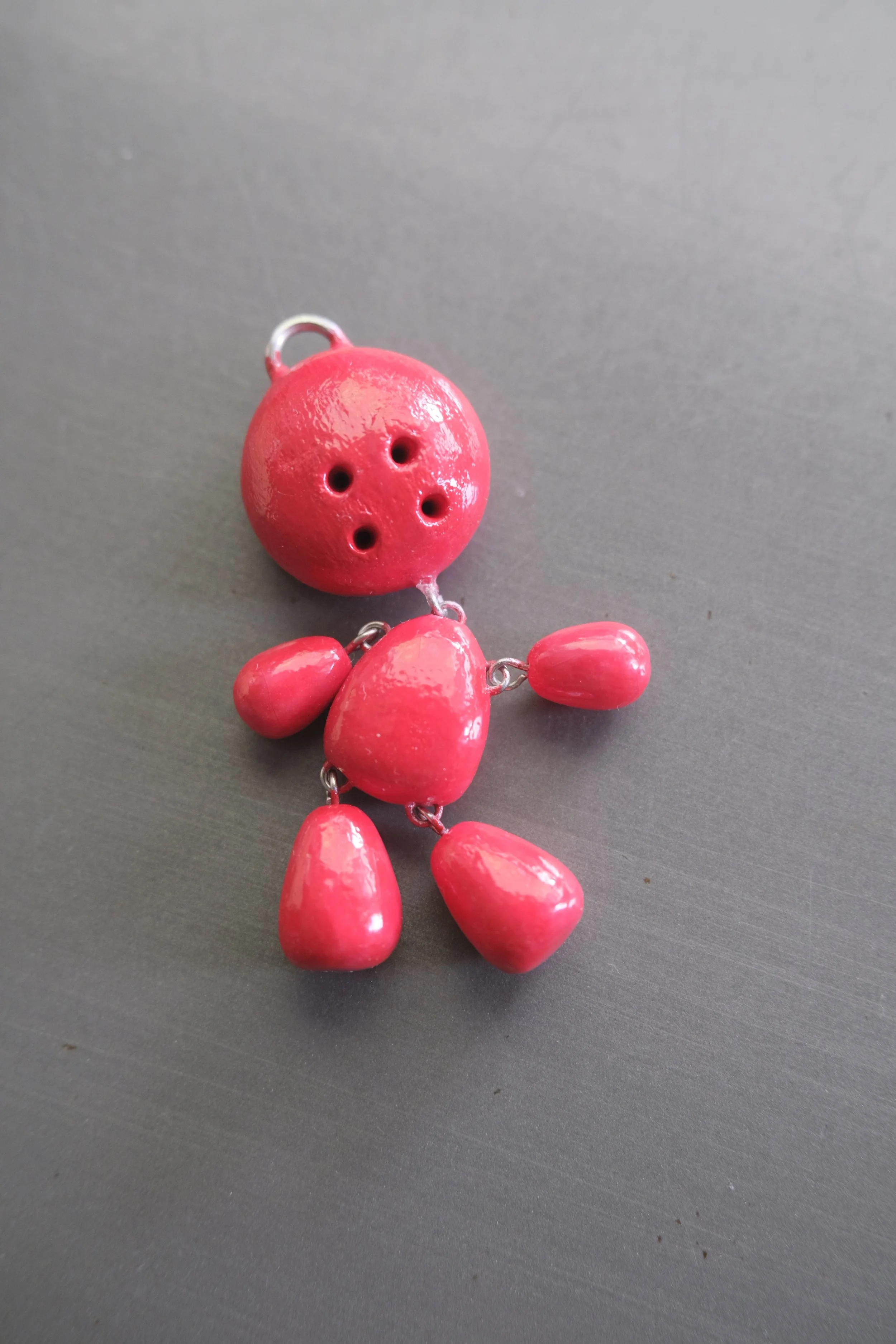 reg (articulated pendant by Jaz, clay)