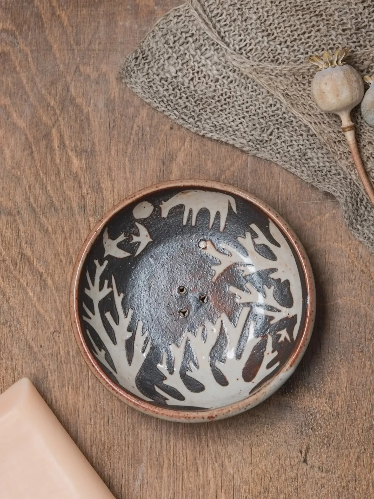 Soap dishes. You may have seen this in my last drop. They were very popular and so I've made some more. They're currently in a box waiting to be trimmed with a little foot ring and then I will decorate them. I'll save a couple to be glazed in shino a