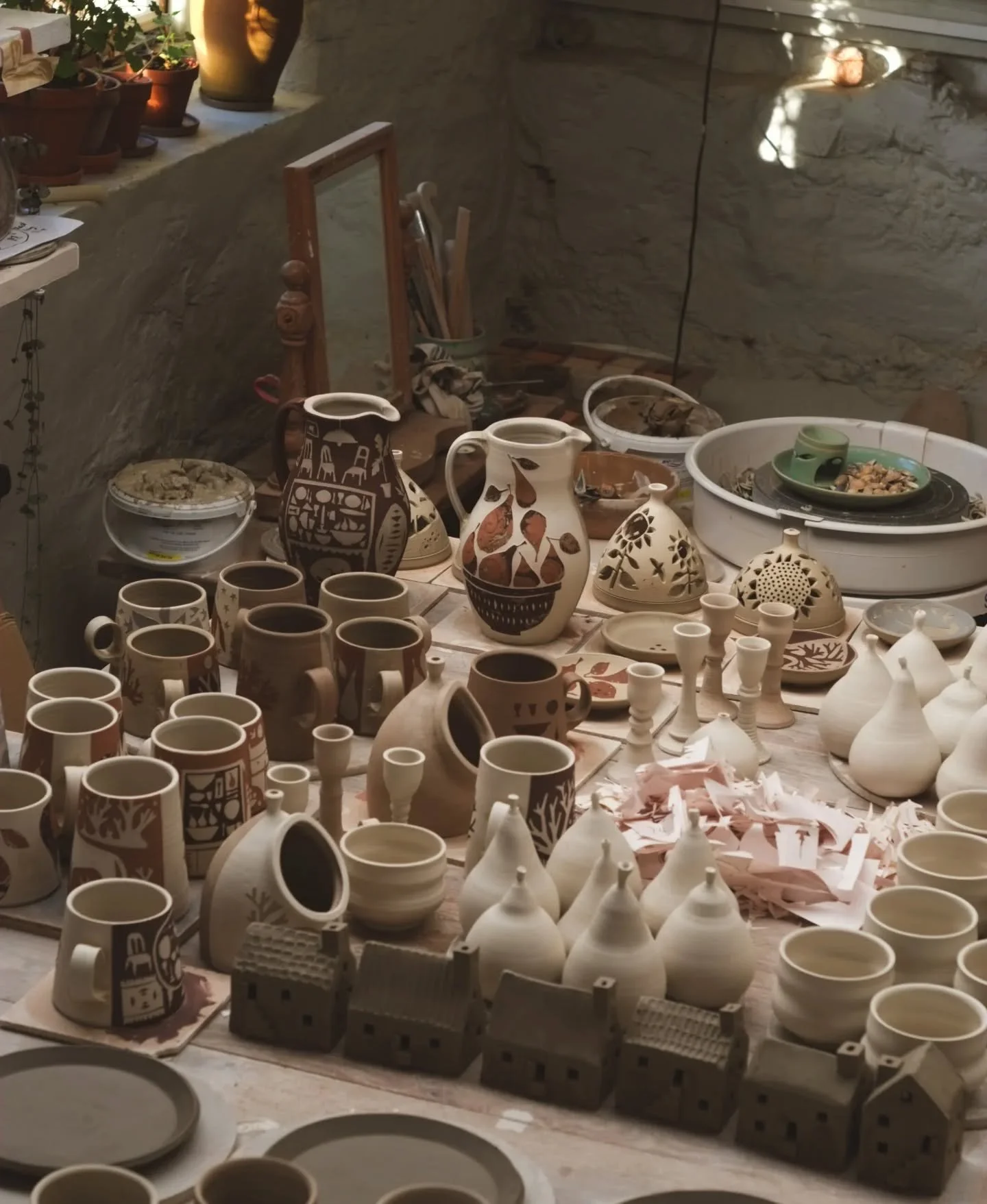 Some photos that I took today, before loading up the kiln for the first firing. I just checked my calendar and found that I started making for this update exactly two weeks ago. I was feeling bad that I hadn't made as much as I'd wanted to, but seein