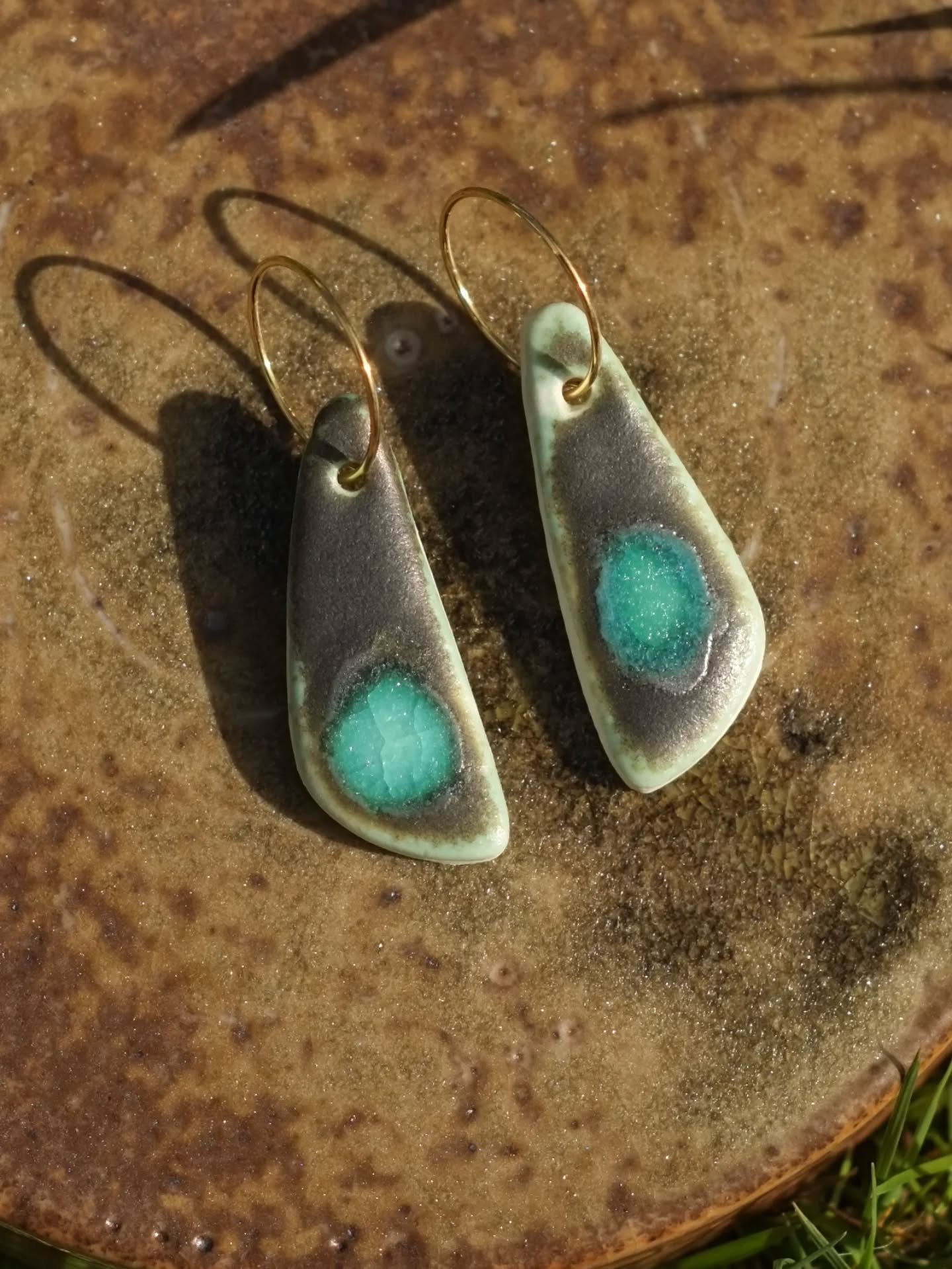 Those of you who have been following long enough will remember my super lightweight, porcelain and melted sea glass earrings. I haven't made them in a while and I'm feeling the pull back to them. They're really magical as each is completely different