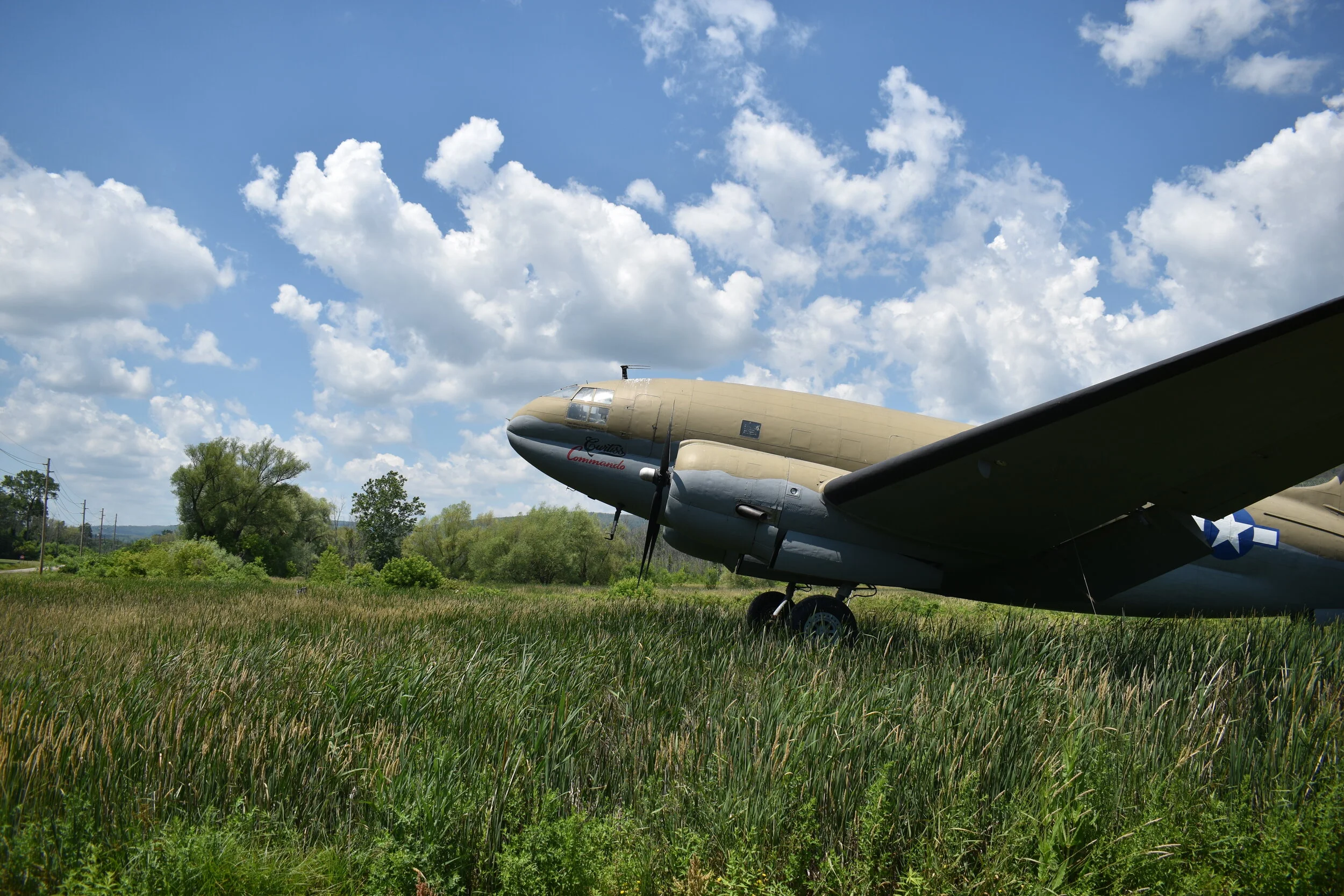 This photo shows a Curtiss-Wright C-46 Commando.  I was intrigued with the massive size of this fascinating aircraft which has a 108 foot wingspan and is over 76 feet in length. This 1943 aircraft Troop and Cargo transport can be seen at the Glenn H.
