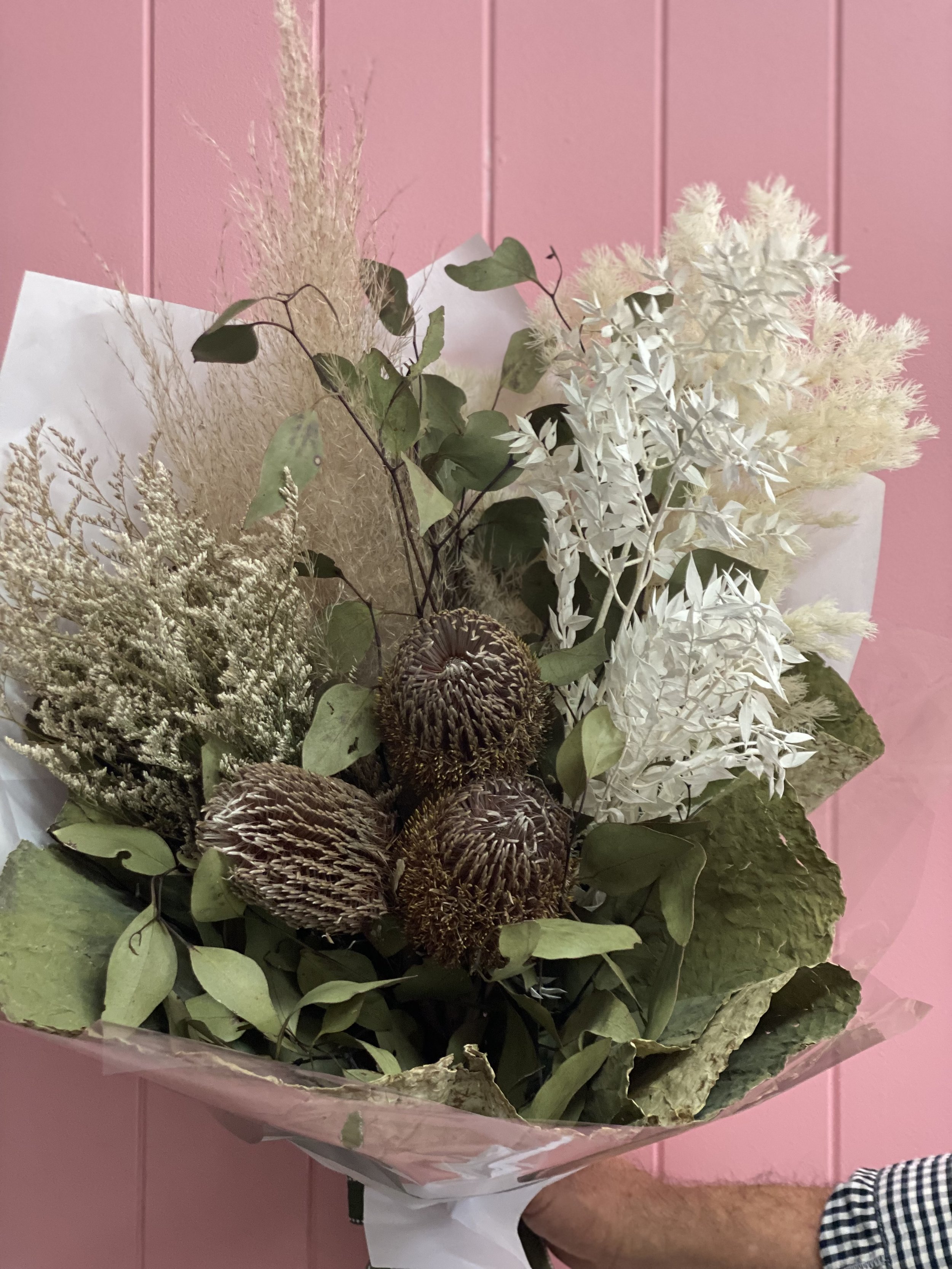 bouquet of dried flowers like banksia and ruscus, in natural tones, for delivery in Brisbane, Wellington Point and the Redlands.