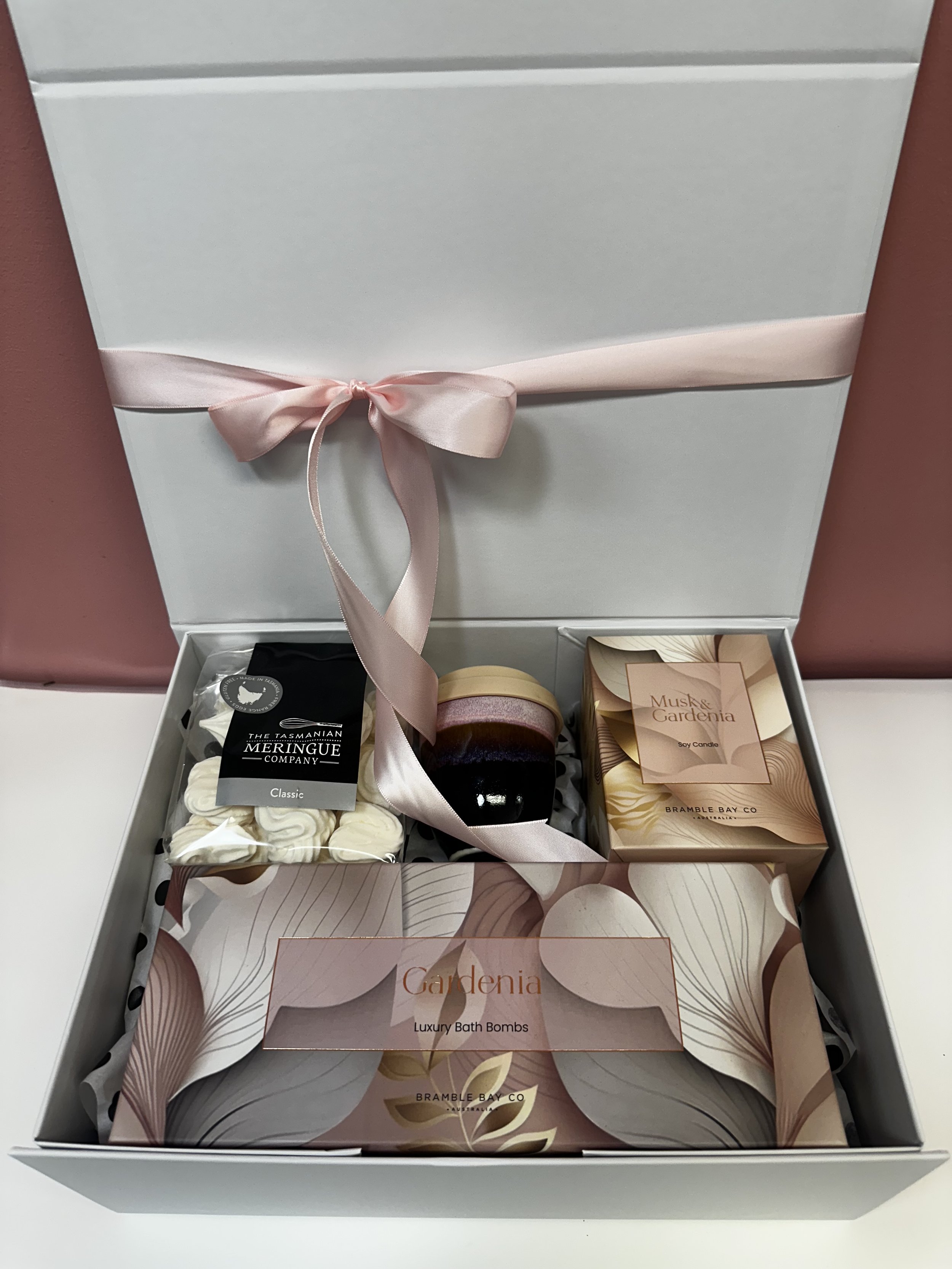 Mother's Day Pamper Gift includes luxury bath bombs, musk and gardenia Soy Candle, Pottery for the Planet keepcup, meringues in white hamper box with magnetic lid