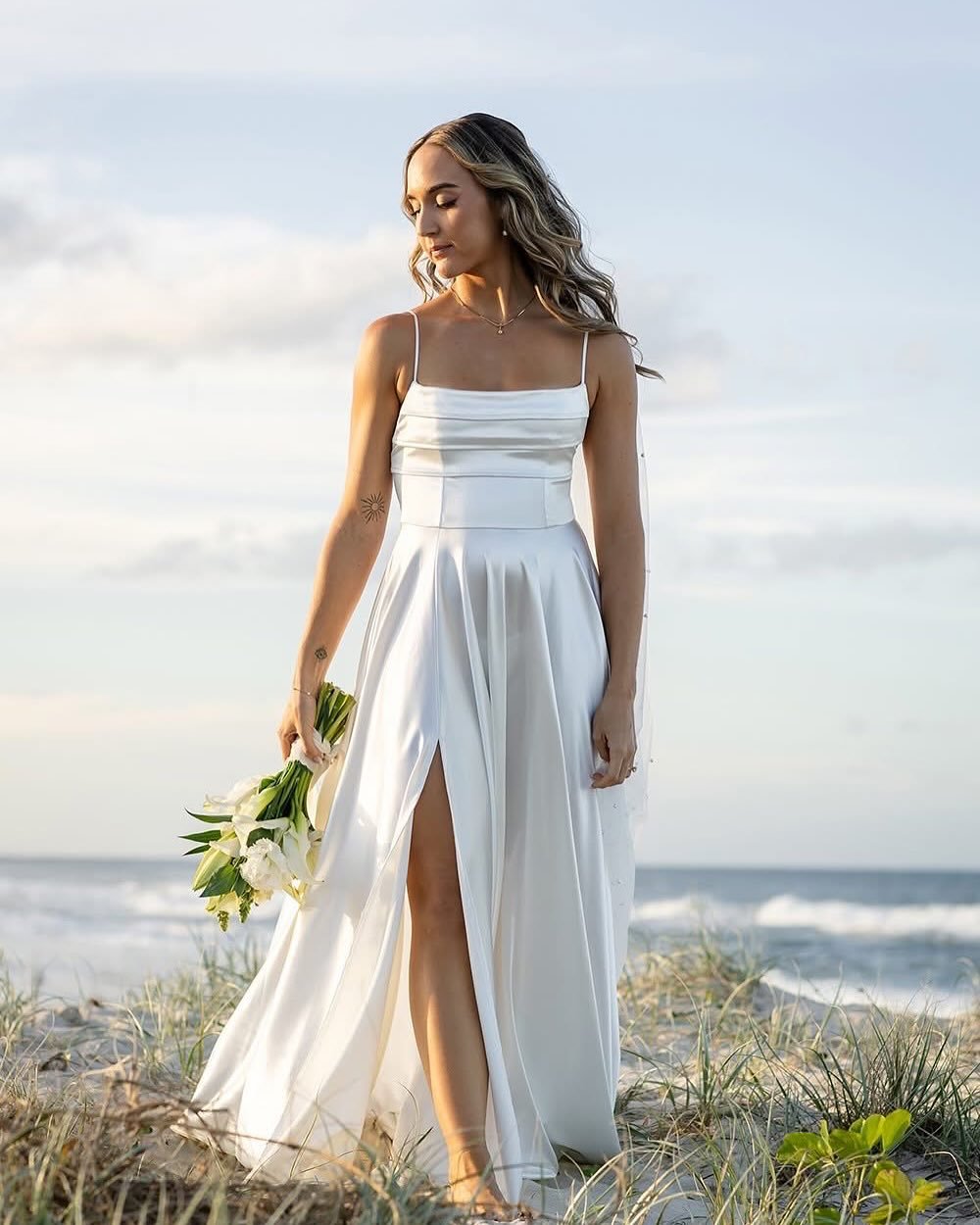 Emily &amp; Kye tied the knot on Currumbin beach and it was all the modern, chic, simple magic we love.

Clean lines, salty air, dreamy blooms by yours truly, and just the right amount of &ldquo;wow&rdquo; without overdoing a thing.

We styled + flor