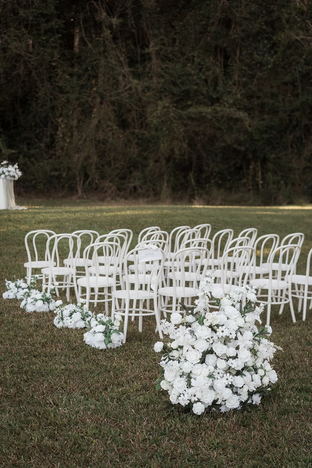 Chairs with faux floral.jpg