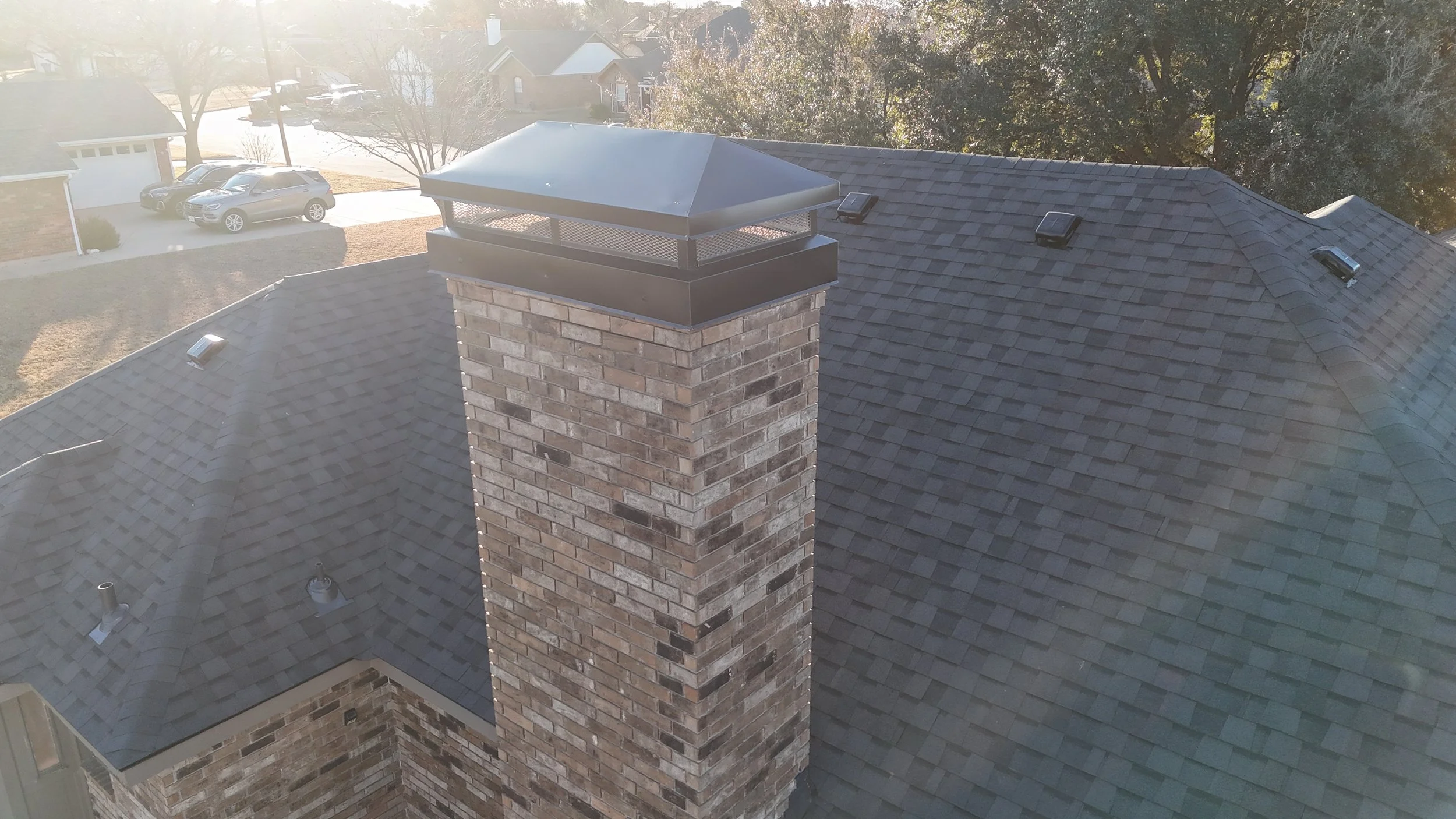 Property Spotlight: Complete Roof Replacement and Custom Chimney Cap Upgrade