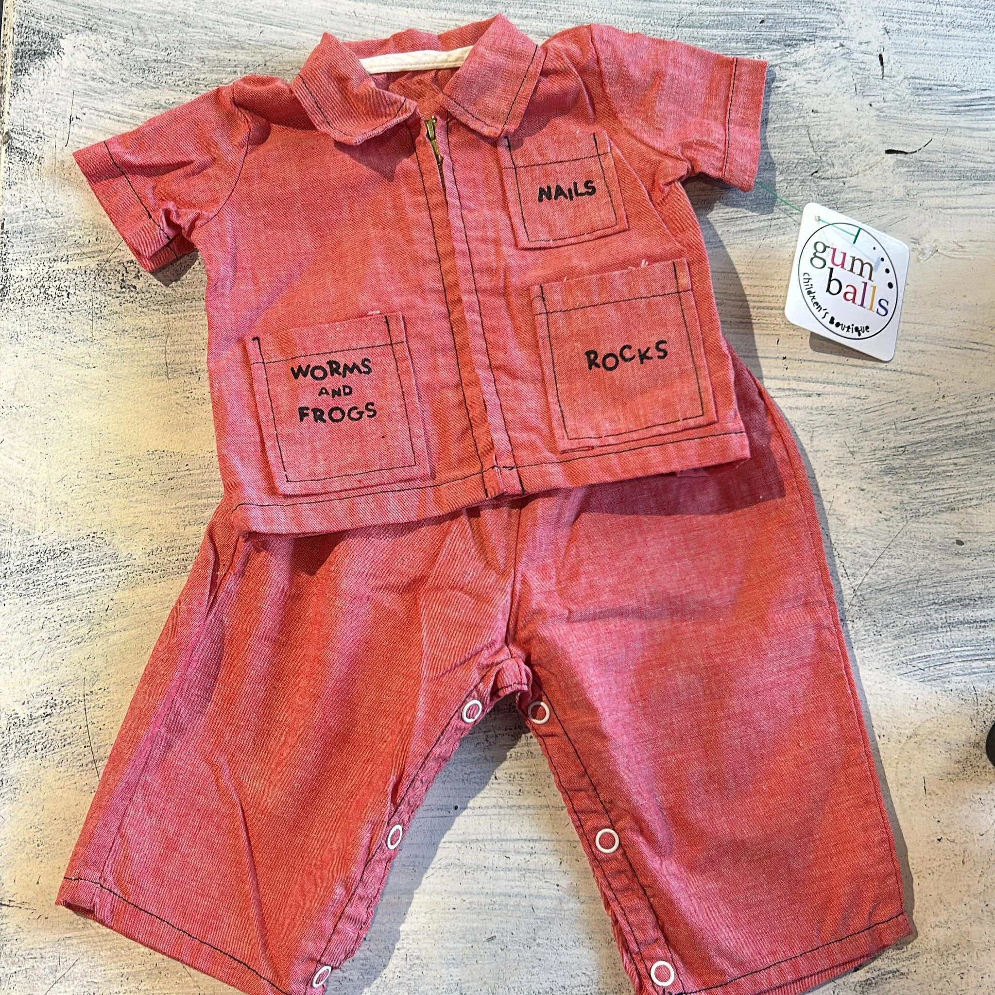 You know how everyone always asks why on earth baby clothes have pockets? Like, what is a 3-month-old actually supposed to keep in there? Well, I found a vintage piece that finally solves the mystery, though I have to say I am definitely NOT recommen