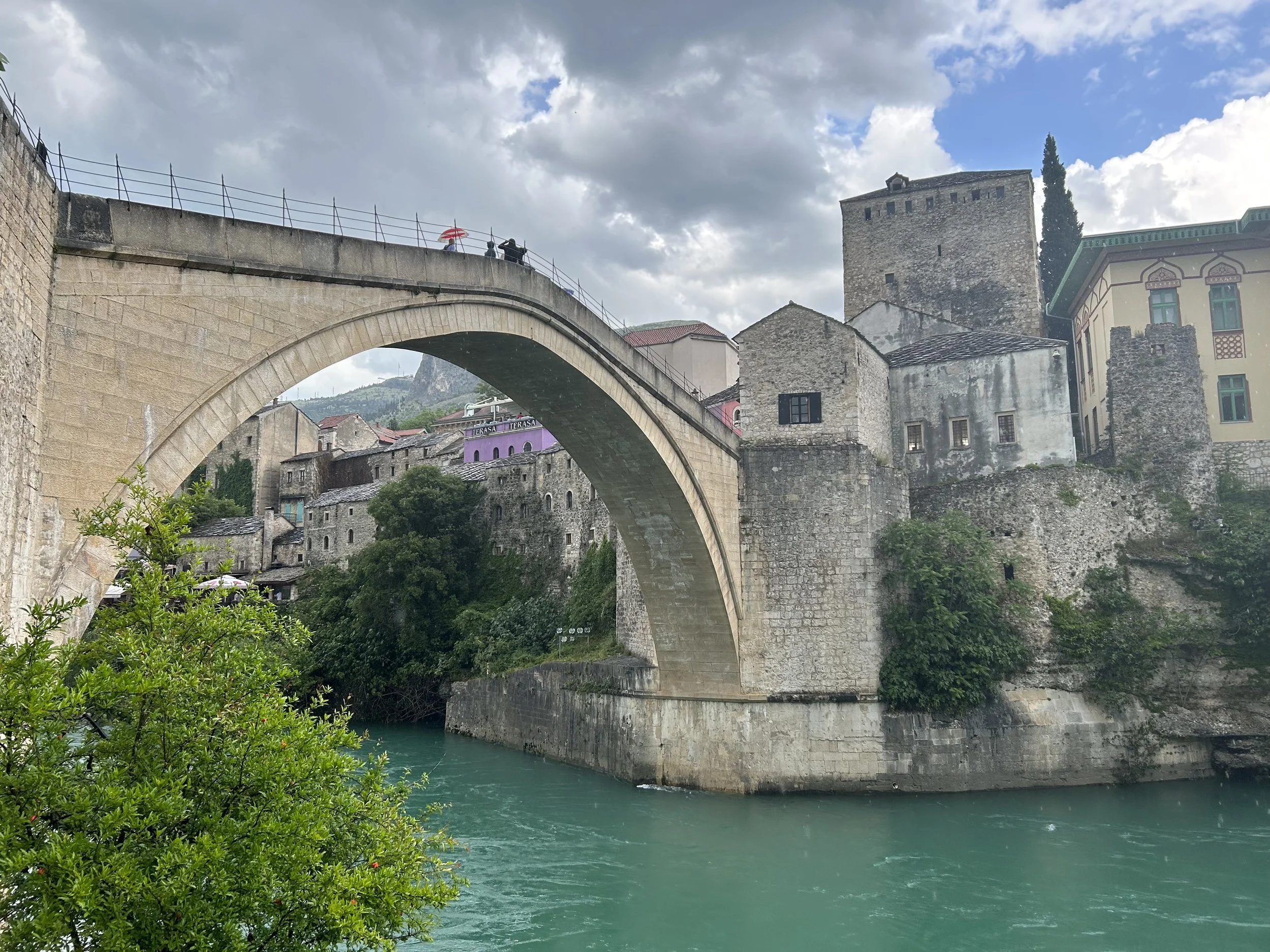 A photo of the Stari Most bridge in Bosnia on a sunny day