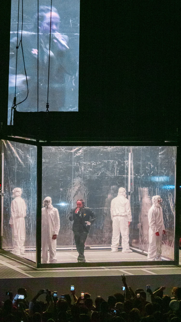 Performer inside a transparent box
